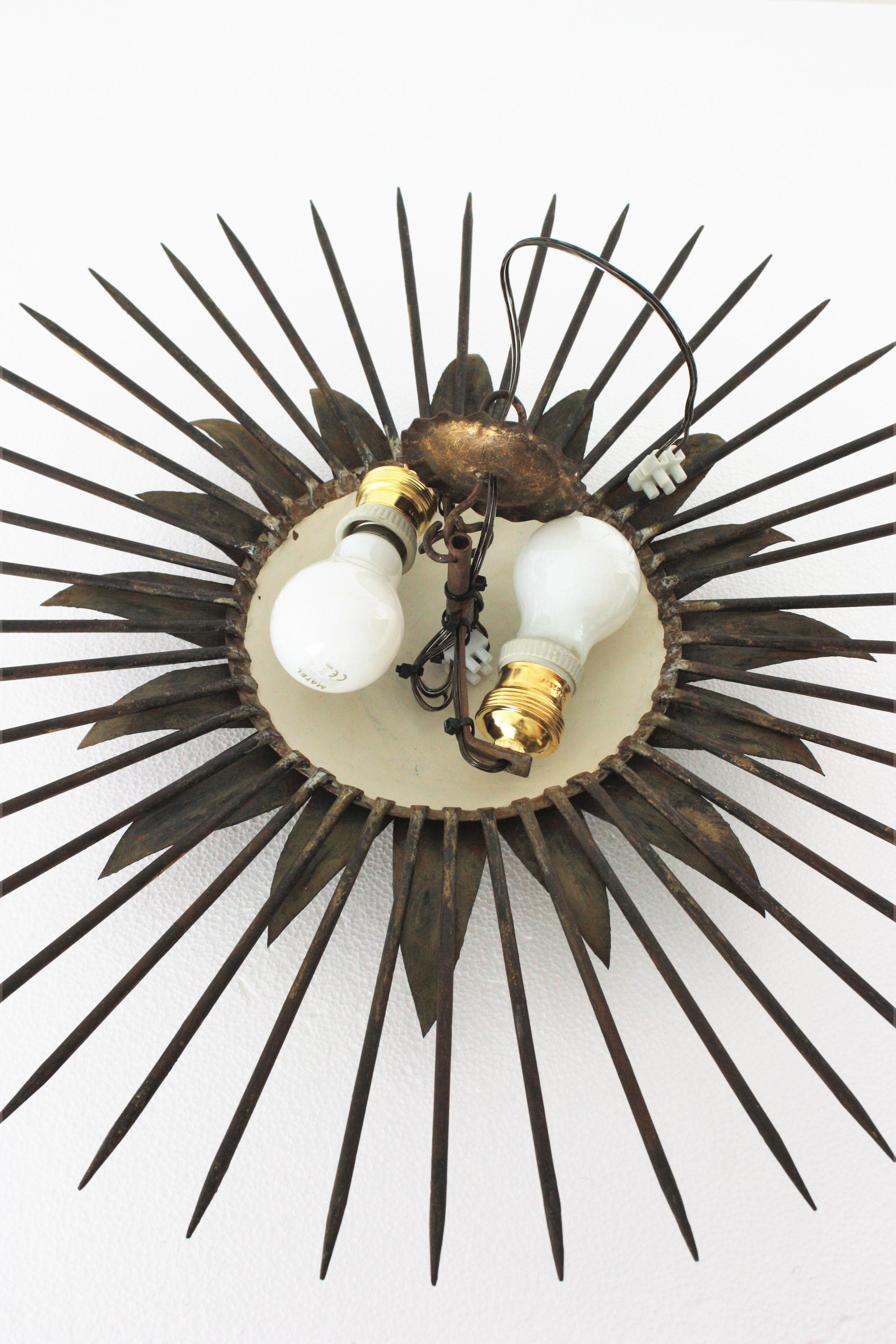 French Sunburst Light Fixture in Gilt Iron with Nail Detail, 1940s For Sale 10