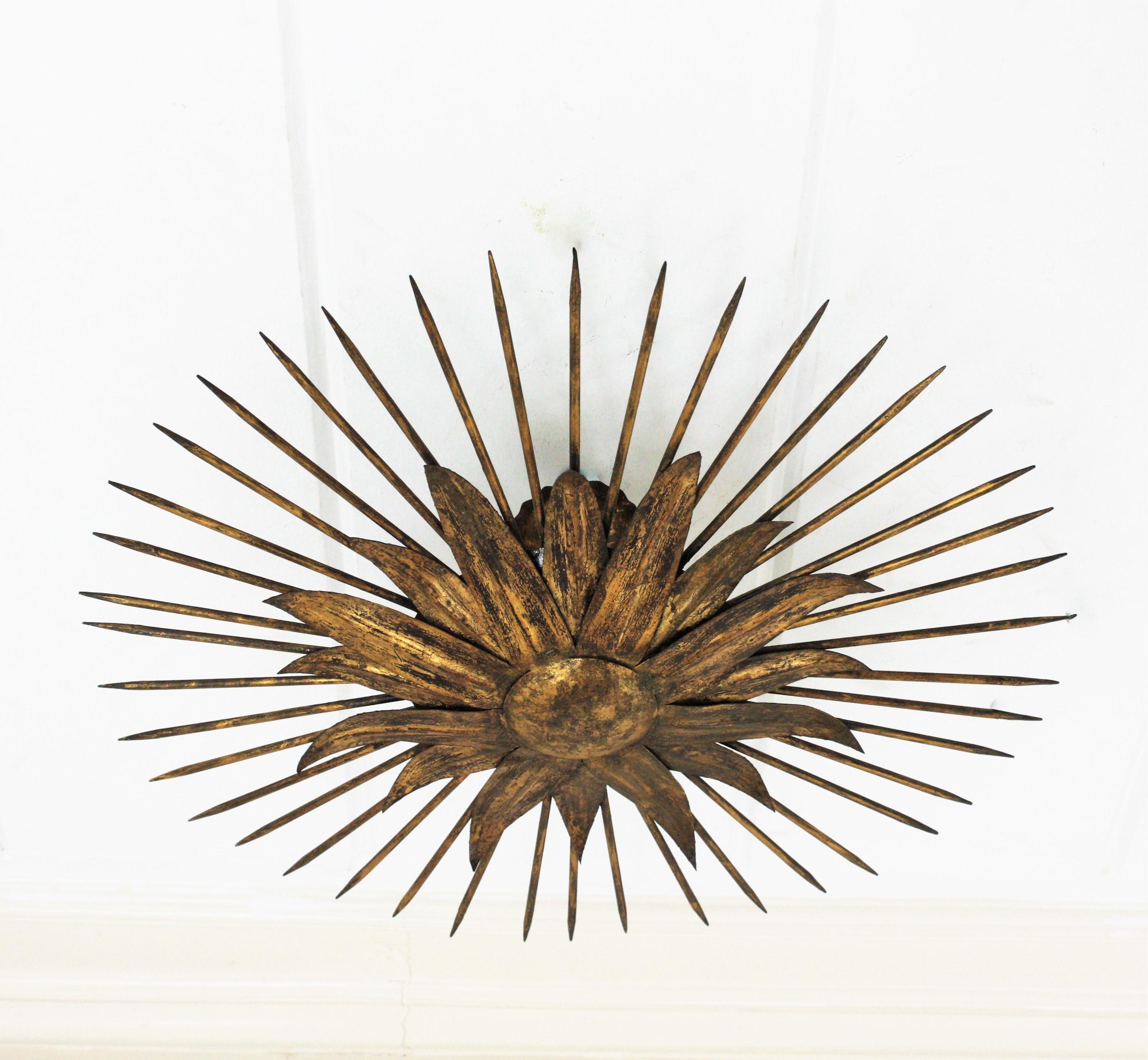 Mid-Century Modern French Sunburst Light Fixture in Gilt Iron with Nail Detail, 1940s For Sale