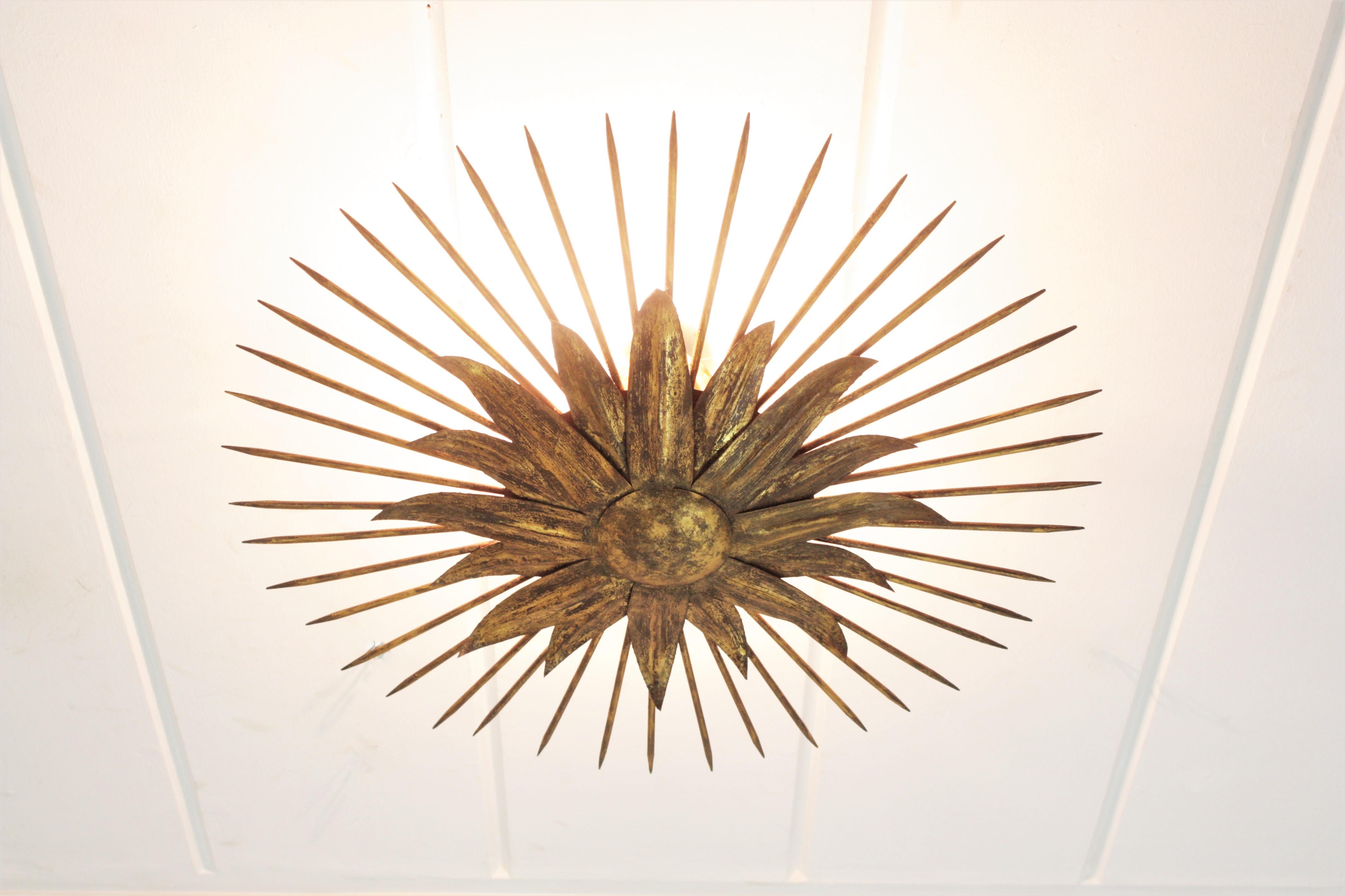 French Sunburst Light Fixture in Gilt Iron with Nail Detail, 1940s In Good Condition For Sale In Barcelona, ES