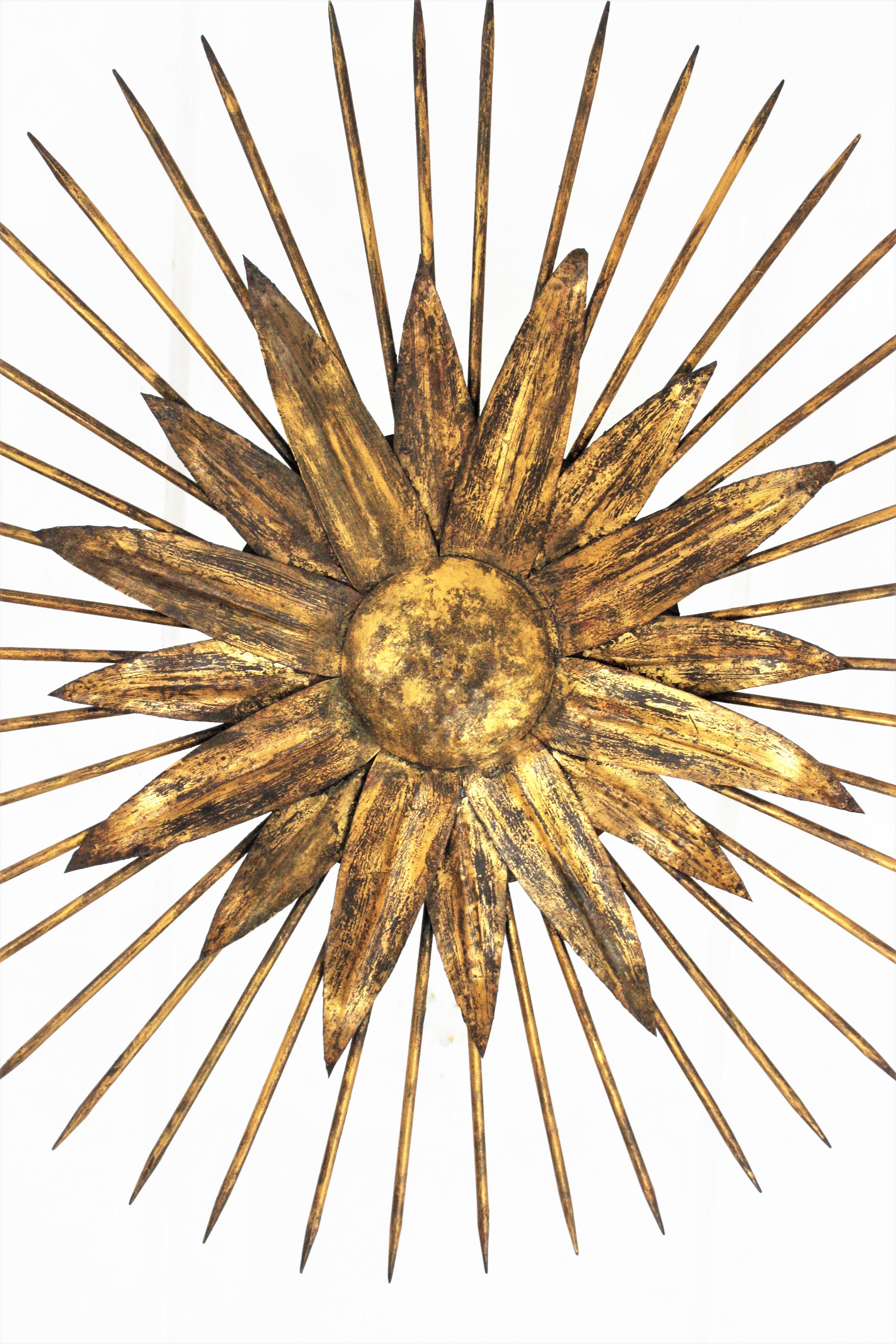 Metal French Sunburst Light Fixture in Gilt Iron with Nail Detail, 1940s For Sale