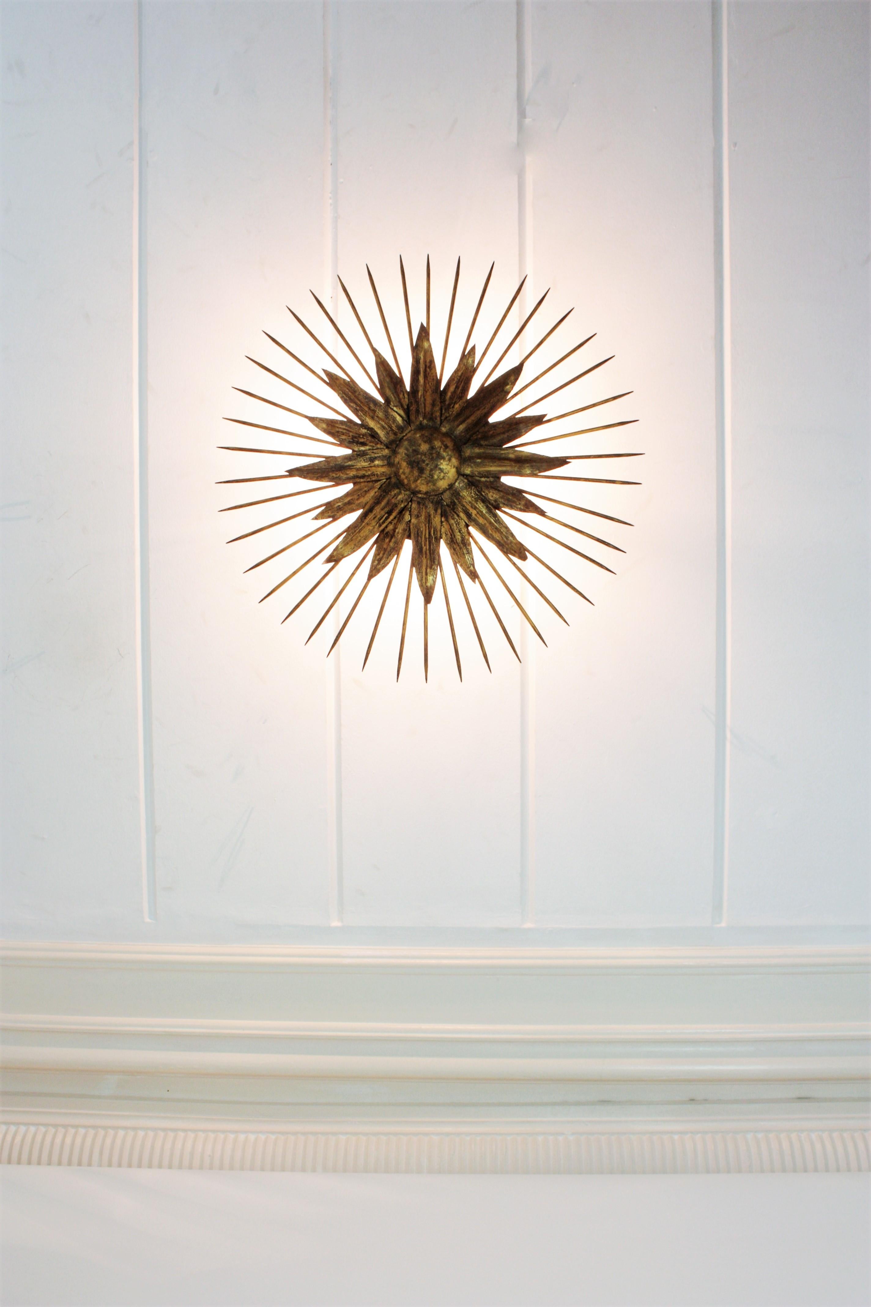 French Sunburst Light Fixture in Gilt Iron with Nail Detail, 1940s For Sale 2