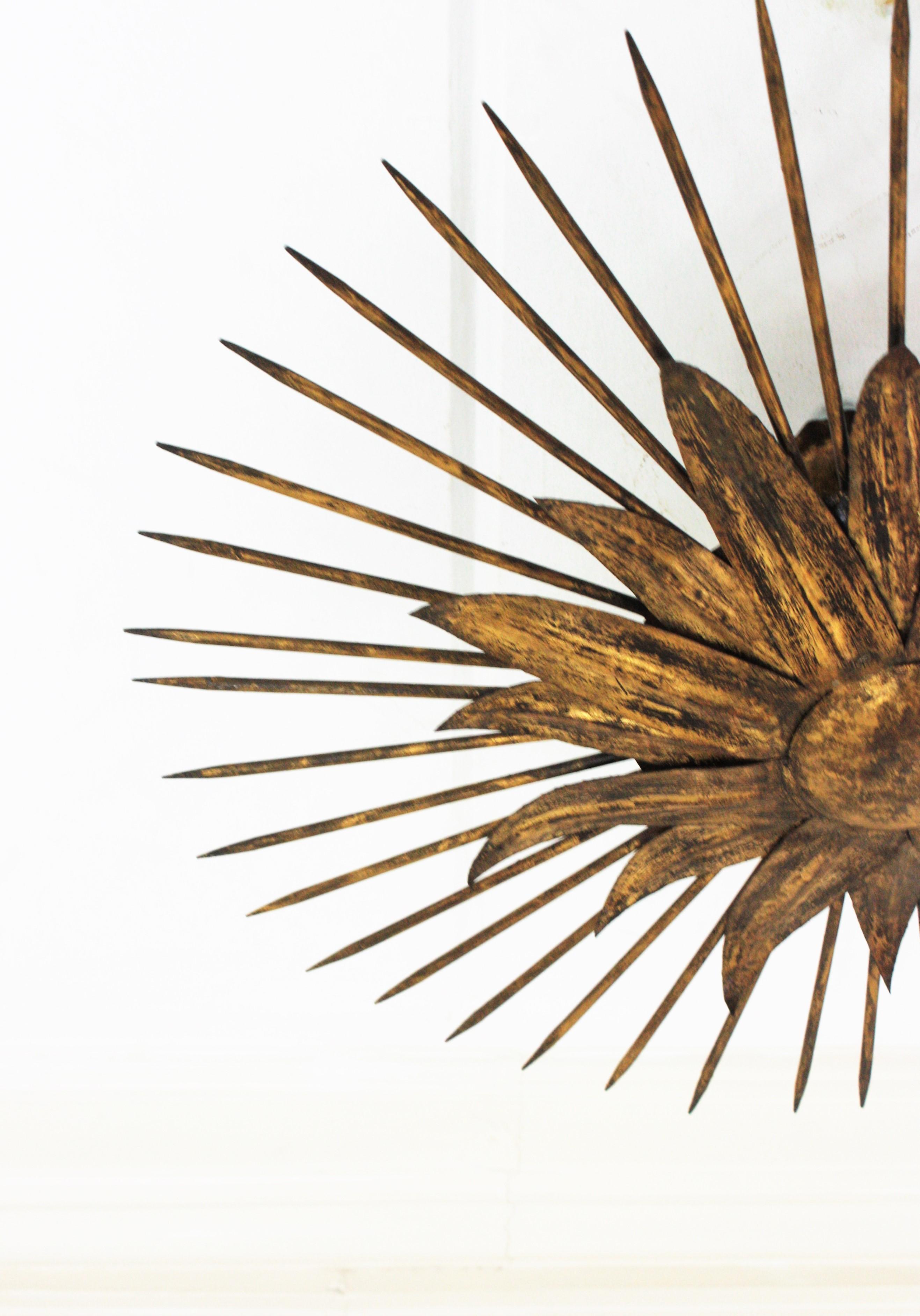 French Sunburst Light Fixture in Gilt Iron with Nail Detail, 1940s For Sale 3