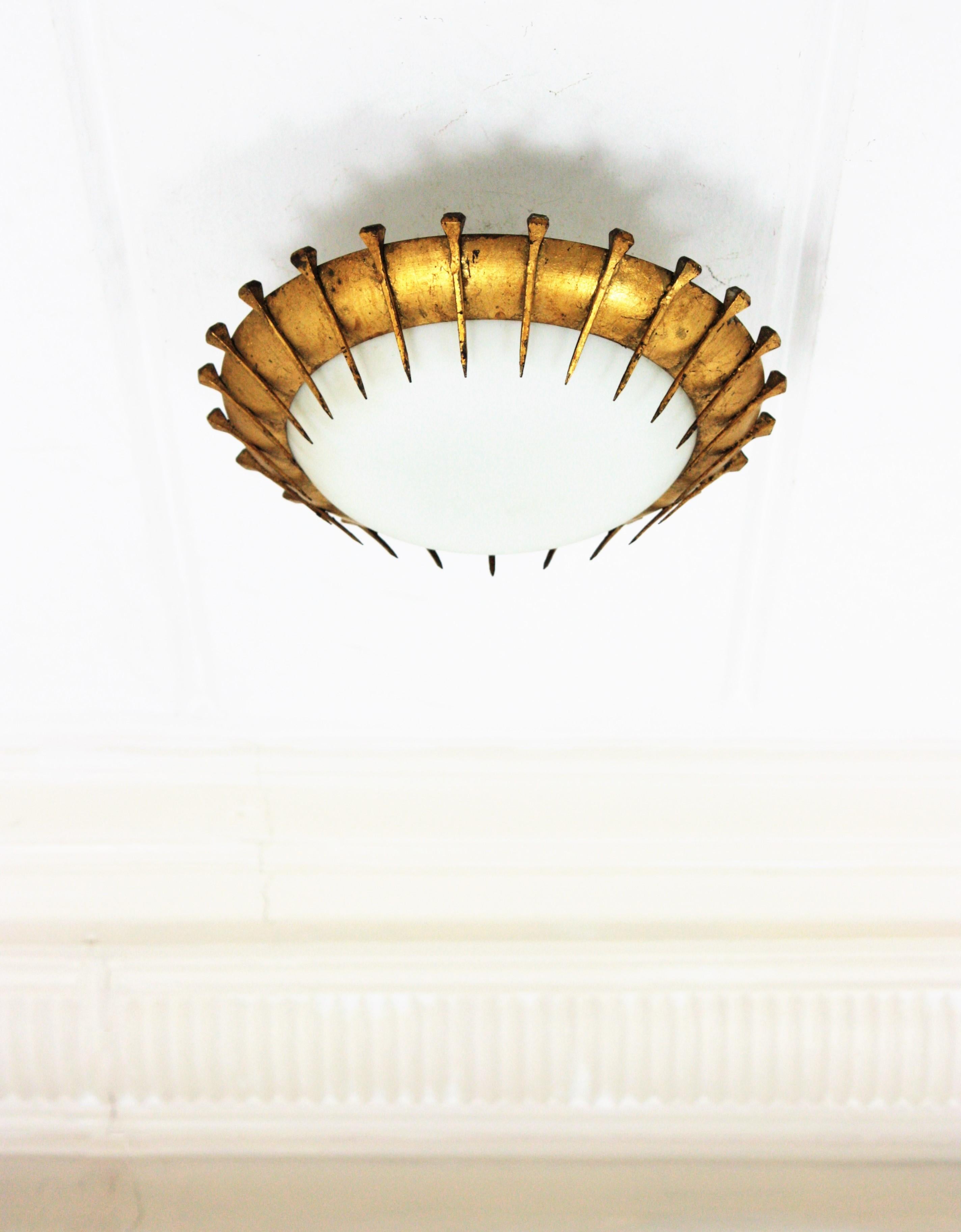 French Sunburst Light Fixture with Nail Design, Gilt Iron and Milk Glass In Good Condition In Barcelona, ES
