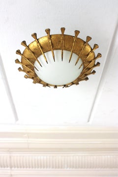 French Sunburst Light Fixture with Nail Design in Gilt Iron and Milk Glass