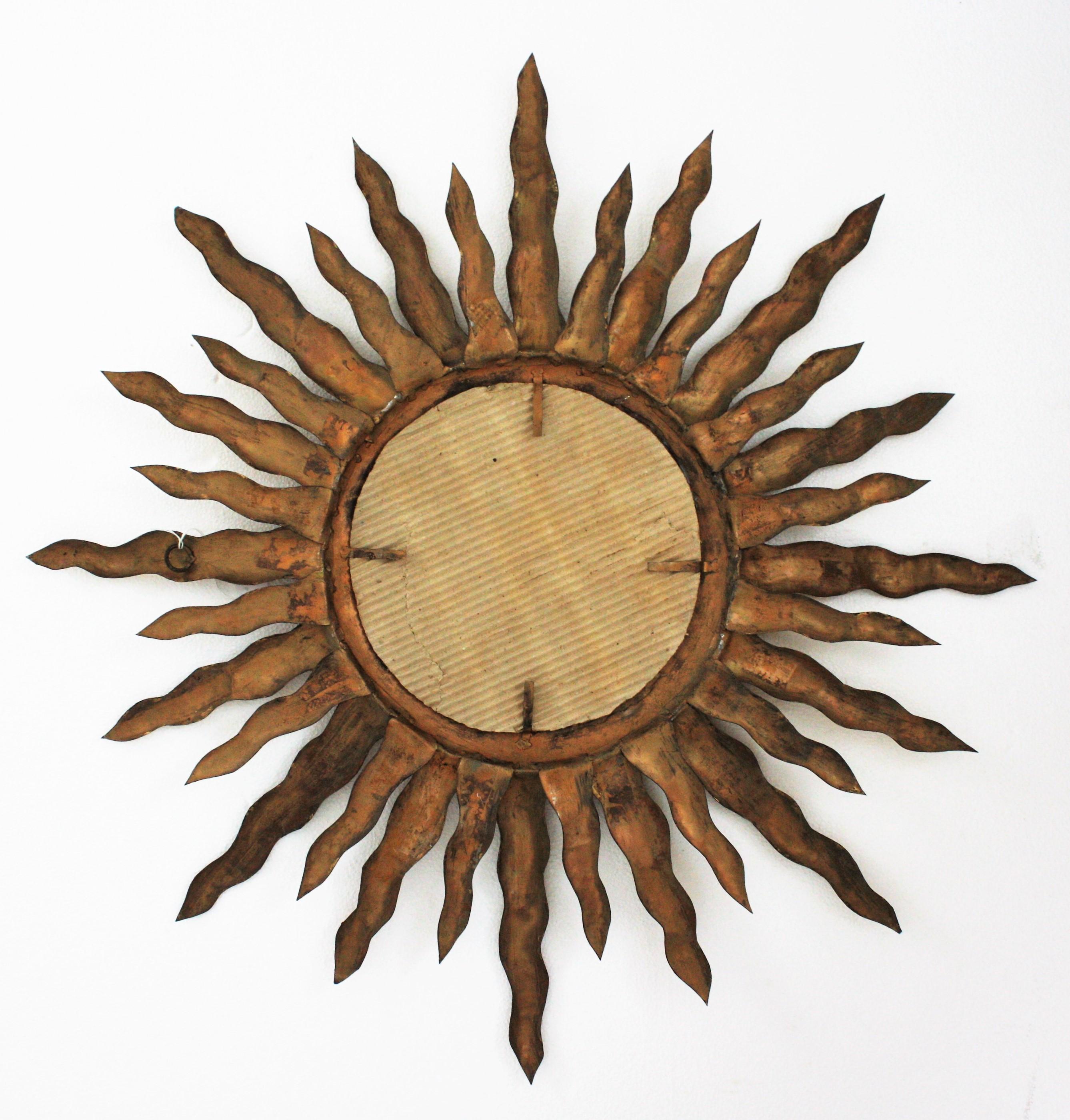 Large Sunburst Mirror in Gilt Iron, 1950s For Sale 1