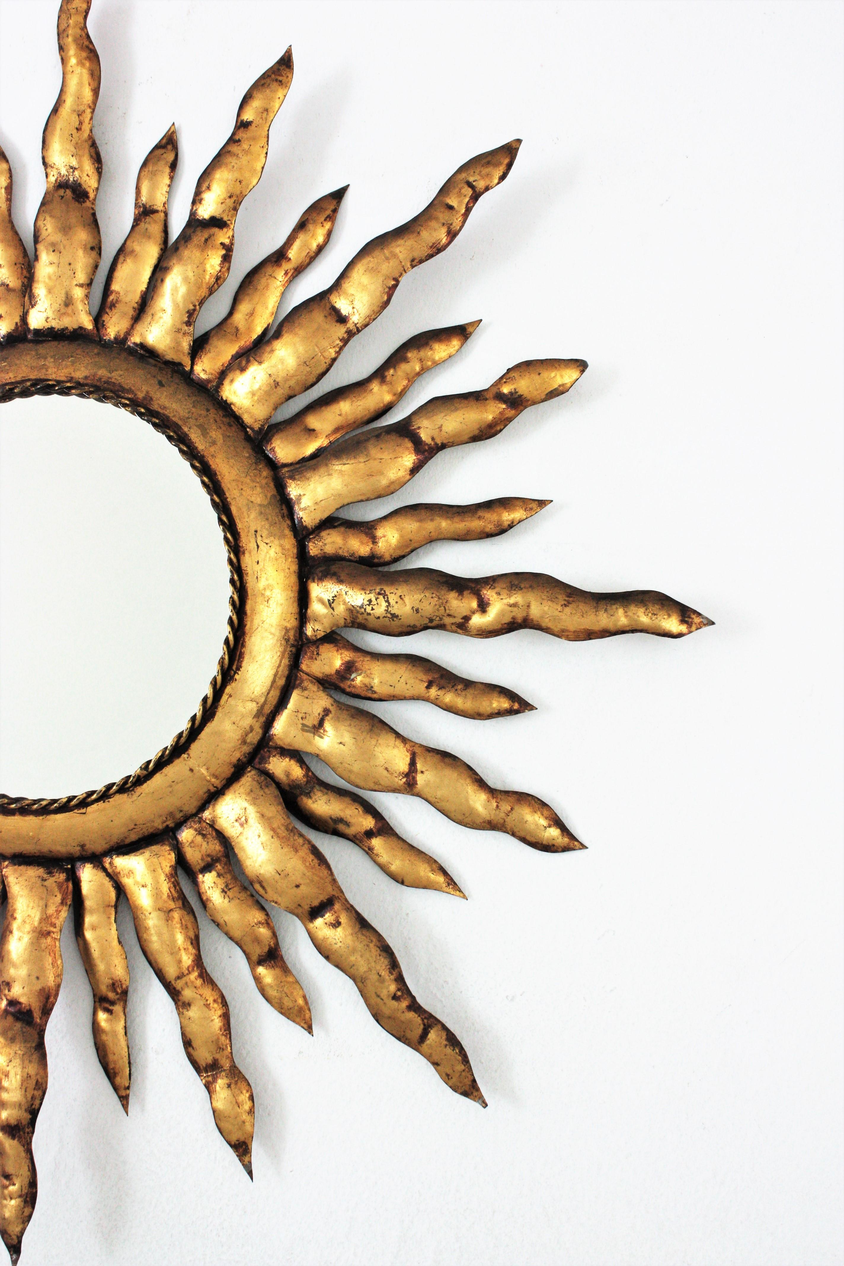 Hand-Crafted French Sunburst Mirror in Gilt Metal, 1950s For Sale