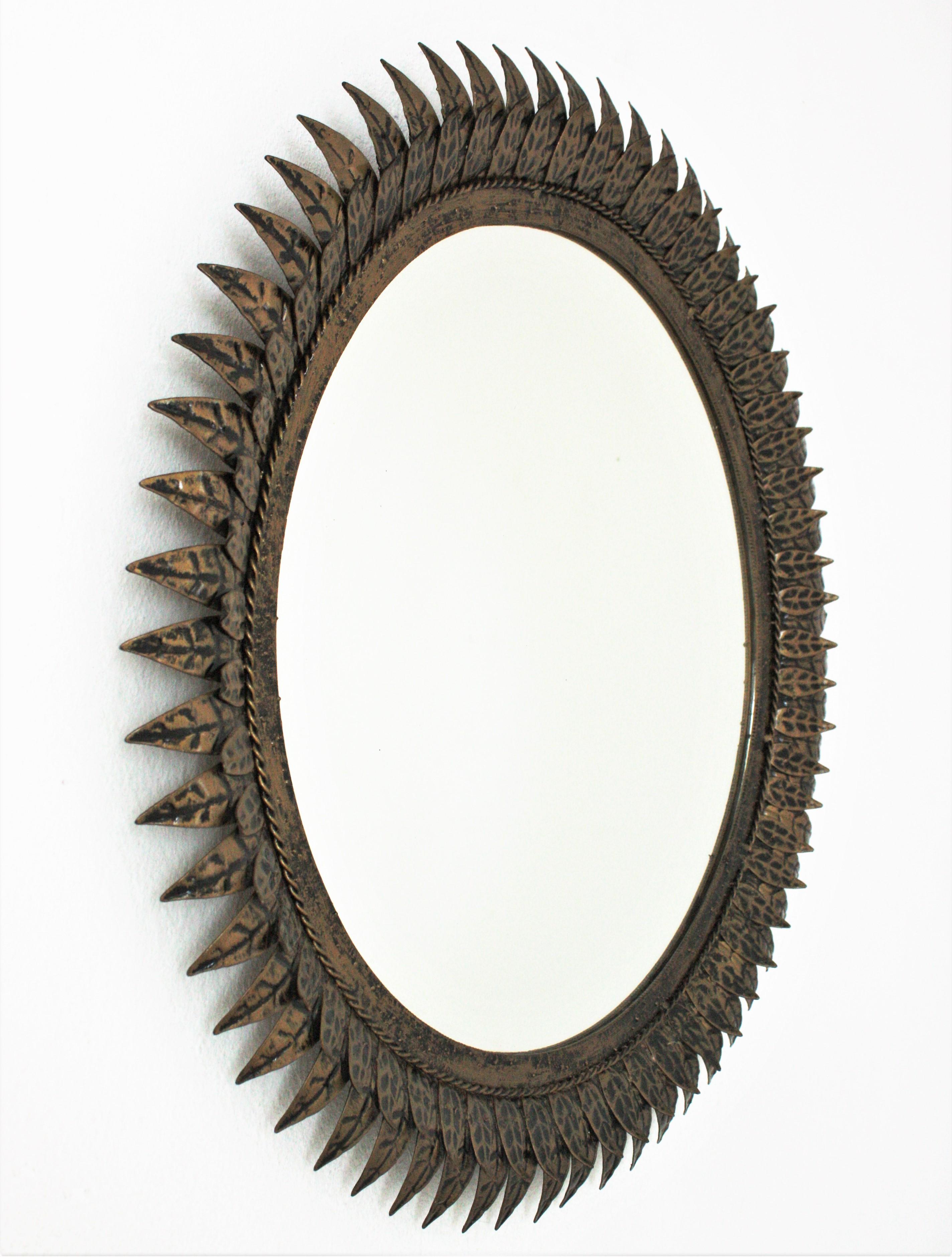 French Sunburst Mirror in Patinated Metal, Style of Line Vautrin For Sale 5