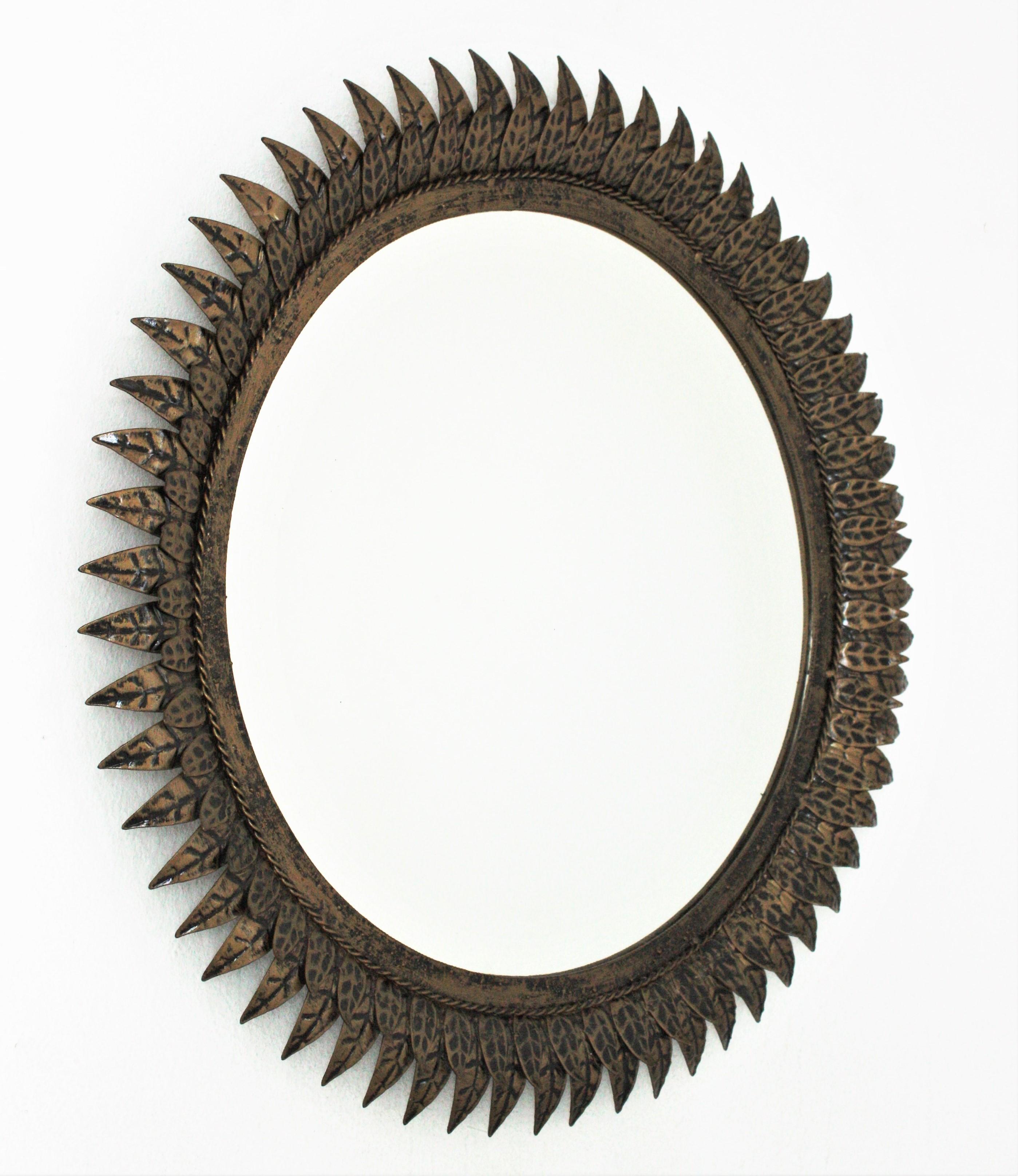 Gilt French Sunburst Mirror in Patinated Metal, Style of Line Vautrin For Sale