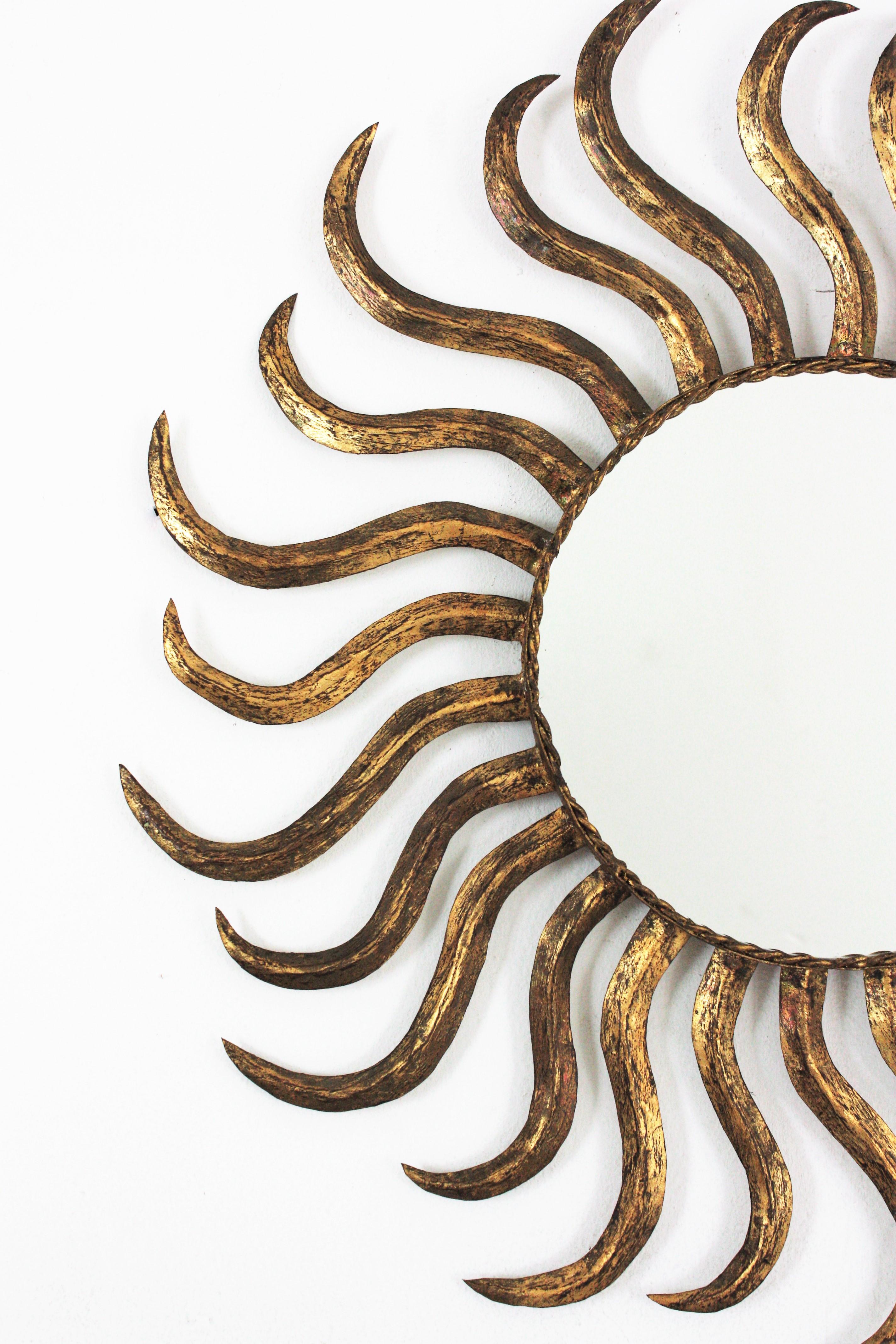 Metal French Sunburst Starburst Mirror in Gilt Iron, 1950s