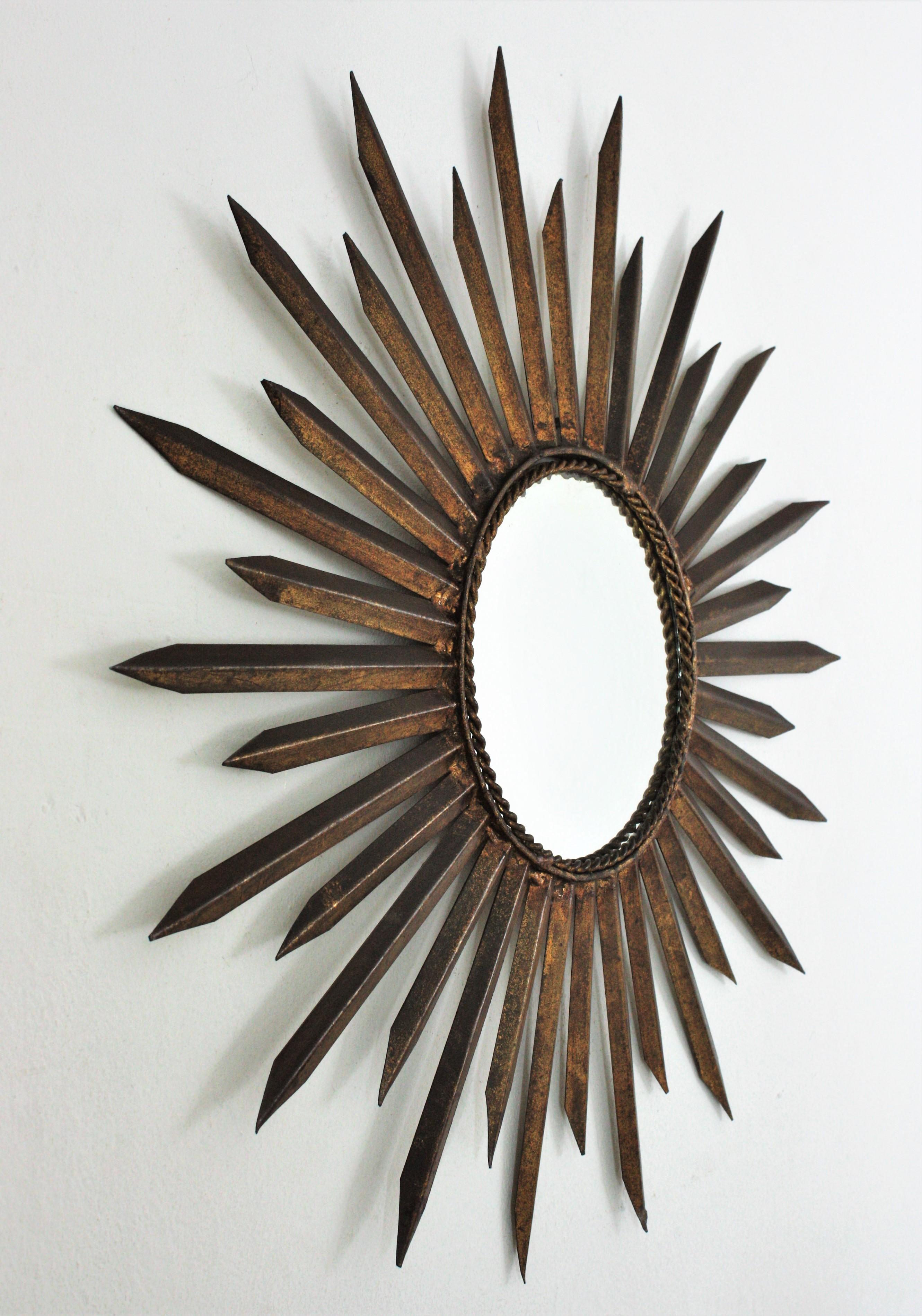 French Sunburst Starburst Mirror in Gilt Iron, Gilbert Poillerat Style For Sale 5