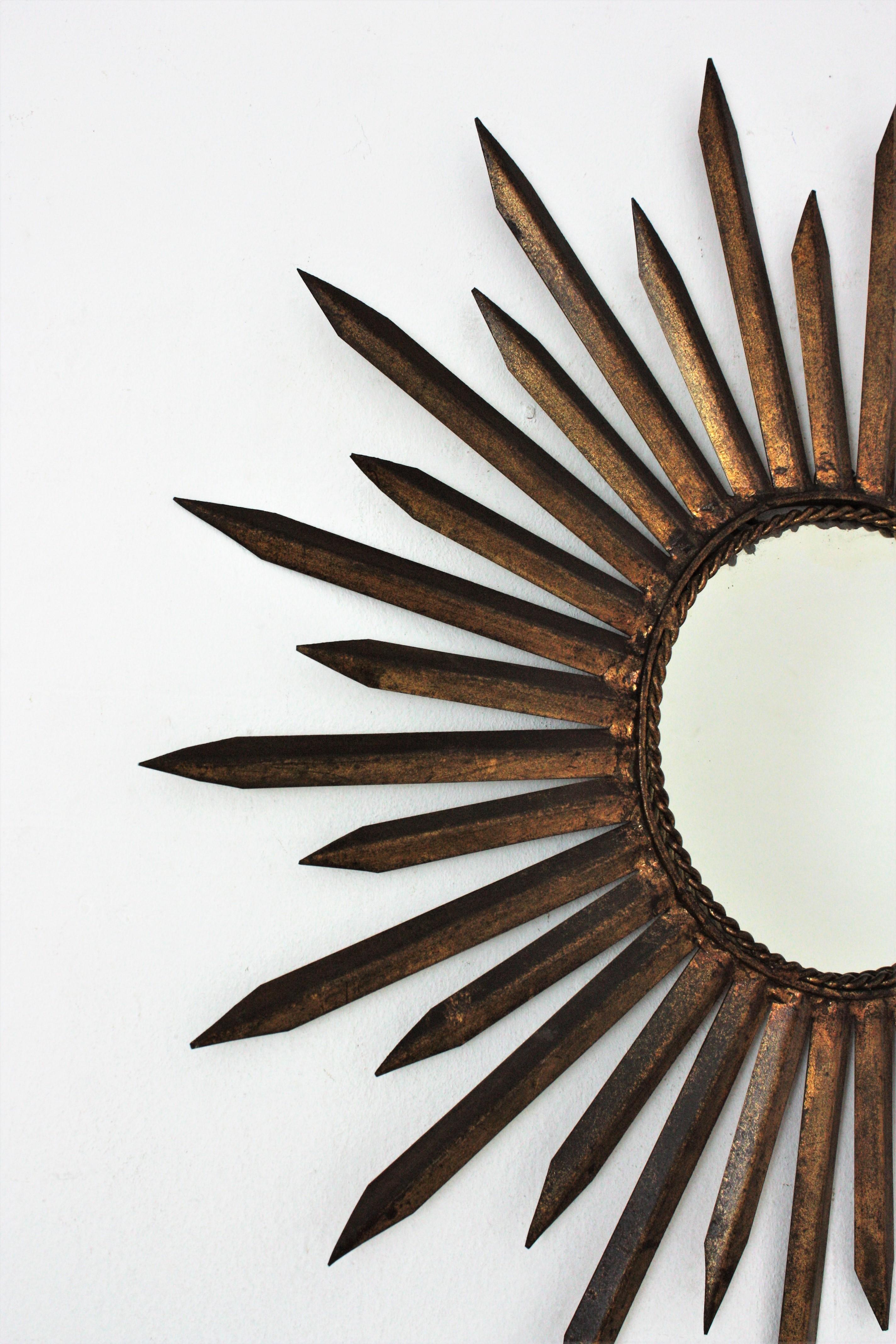 French Sunburst Starburst Mirror in Gilt Iron, Gilbert Poillerat Style In Good Condition For Sale In Barcelona, ES