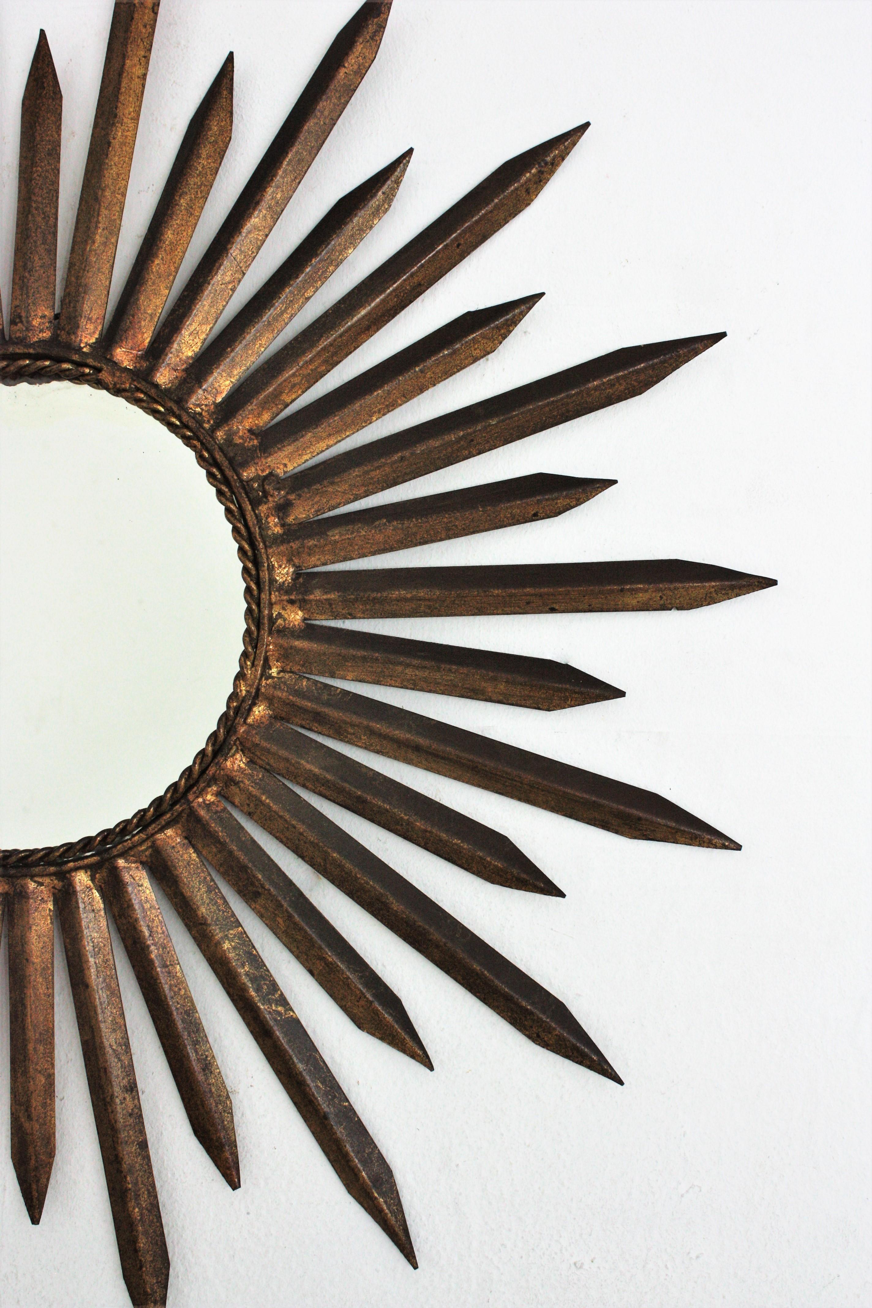 French Sunburst Starburst Mirror in Gilt Iron, Gilbert Poillerat Style For Sale 1