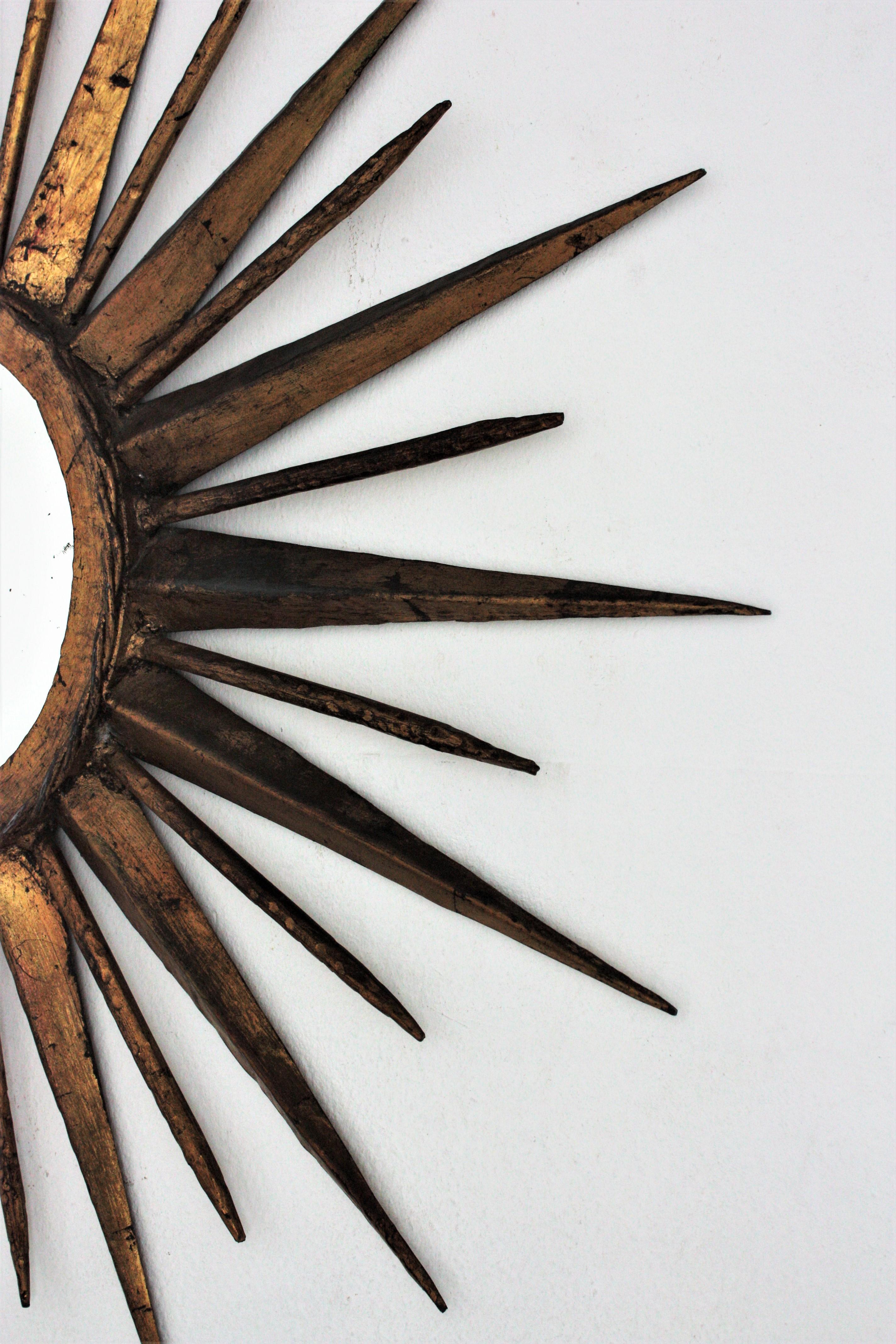 Forged French Sunburst Starburst Mirror in Gilt Iron, Gilbert Poillerat Style