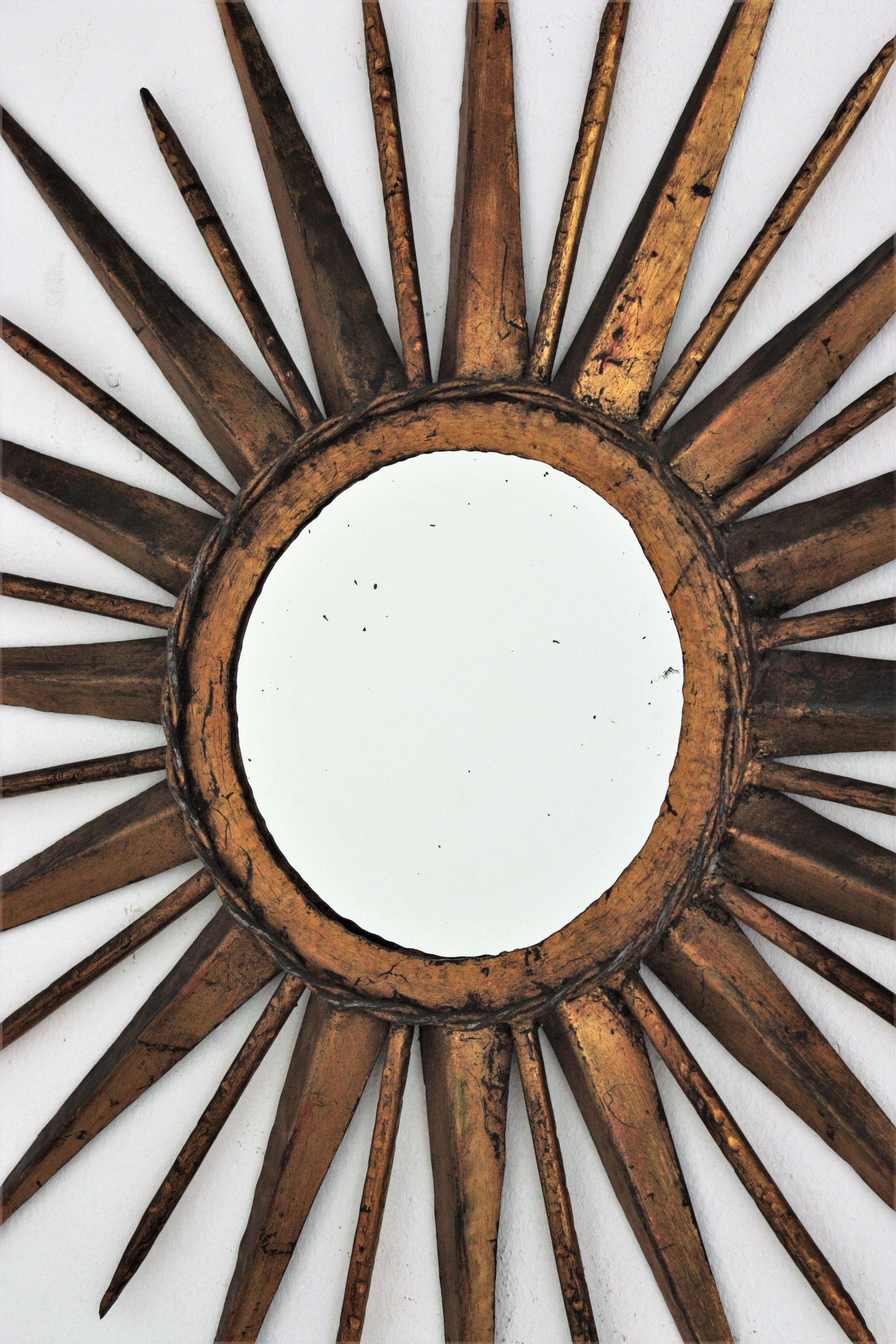 French Sunburst Starburst Mirror in Gilt Iron, Gilbert Poillerat Style In Good Condition In Barcelona, ES