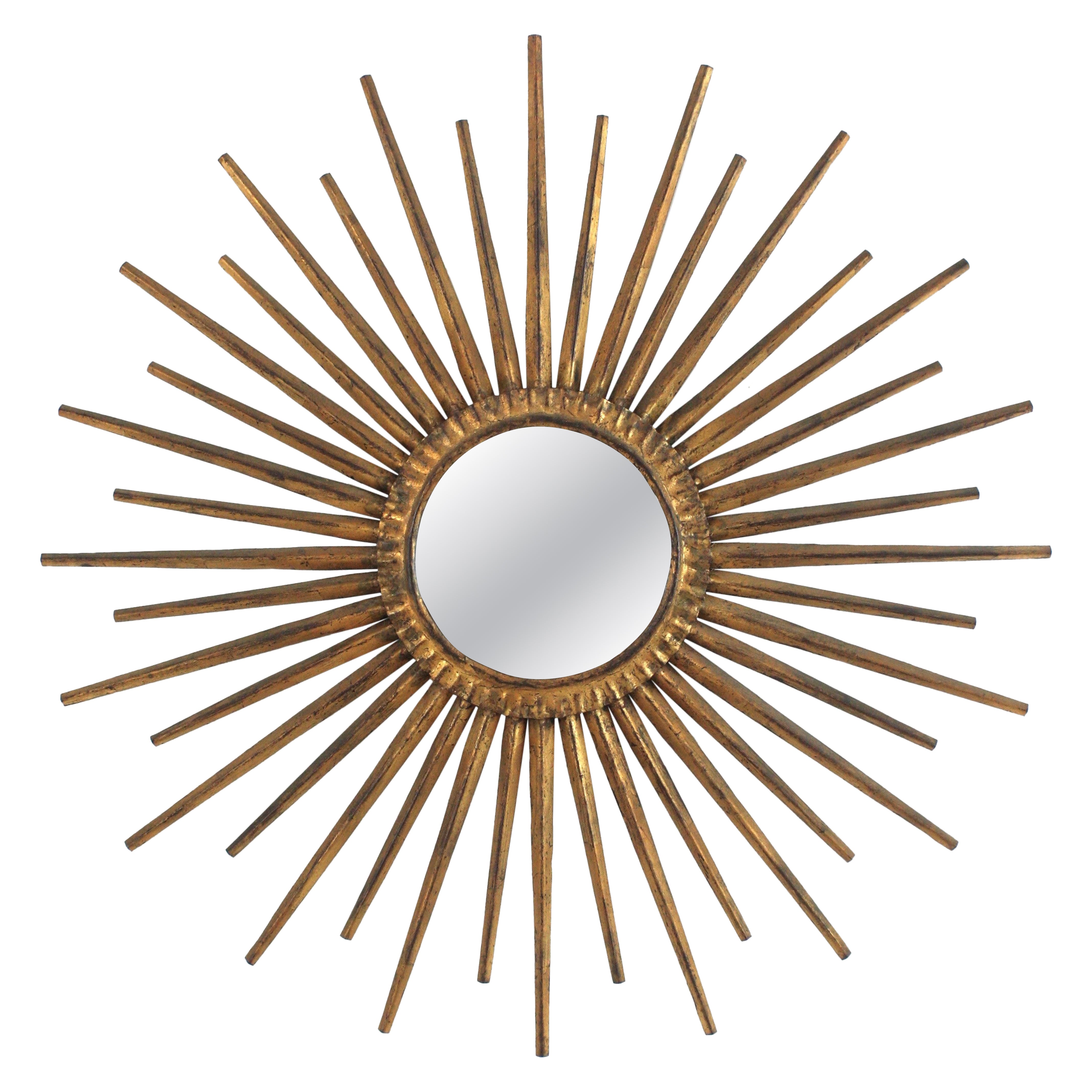 French Sunburst Starburst Mirror in Gilt Iron in the Style of Gilbert Poillerat
