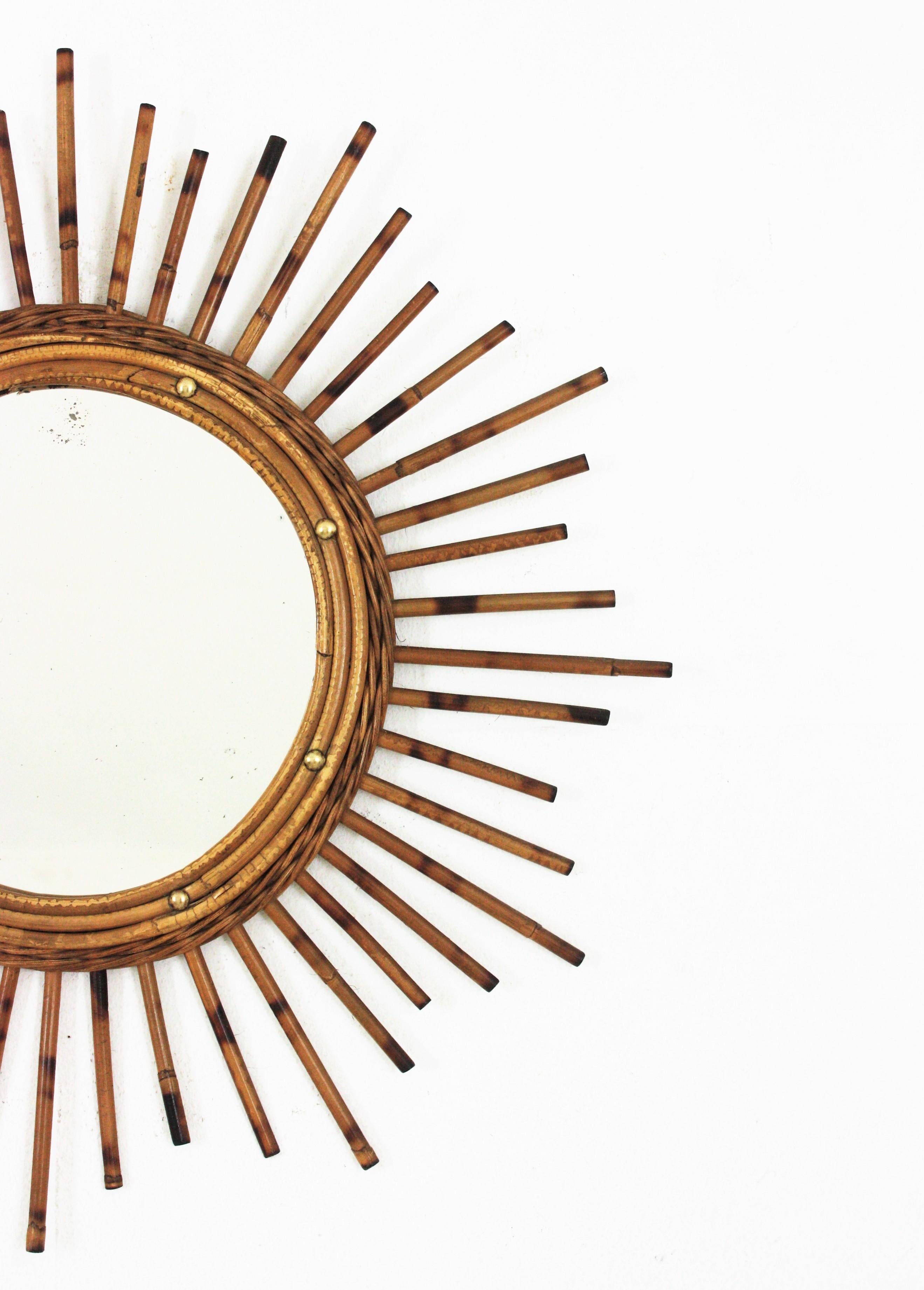 French Sunburst Starburst Mirror in Rattan, 1960s  In Good Condition For Sale In Barcelona, ES