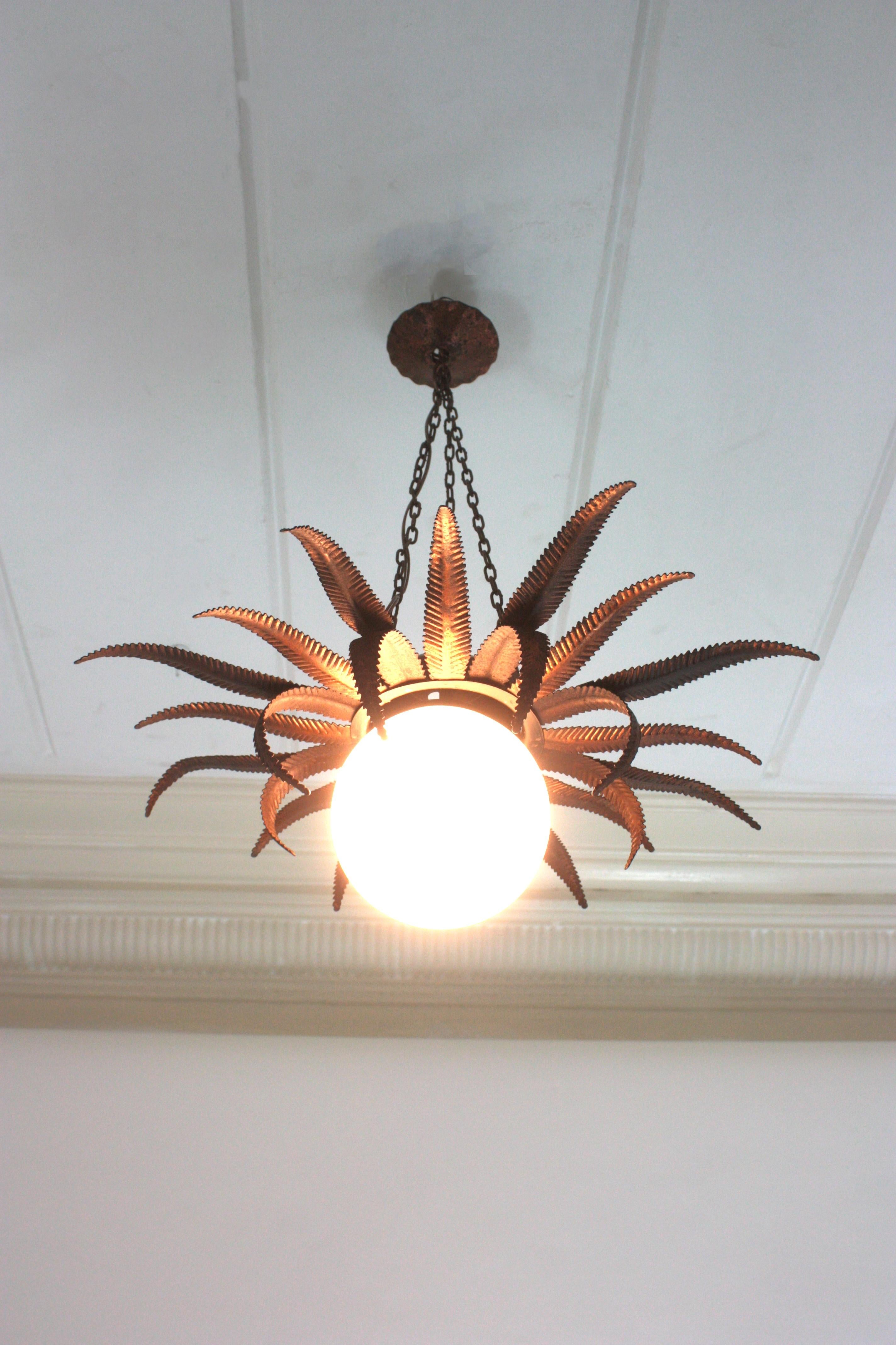 Hammered French Sunburst Starburst Pendant Light Fixture in Copper Metal and Milk Glass For Sale