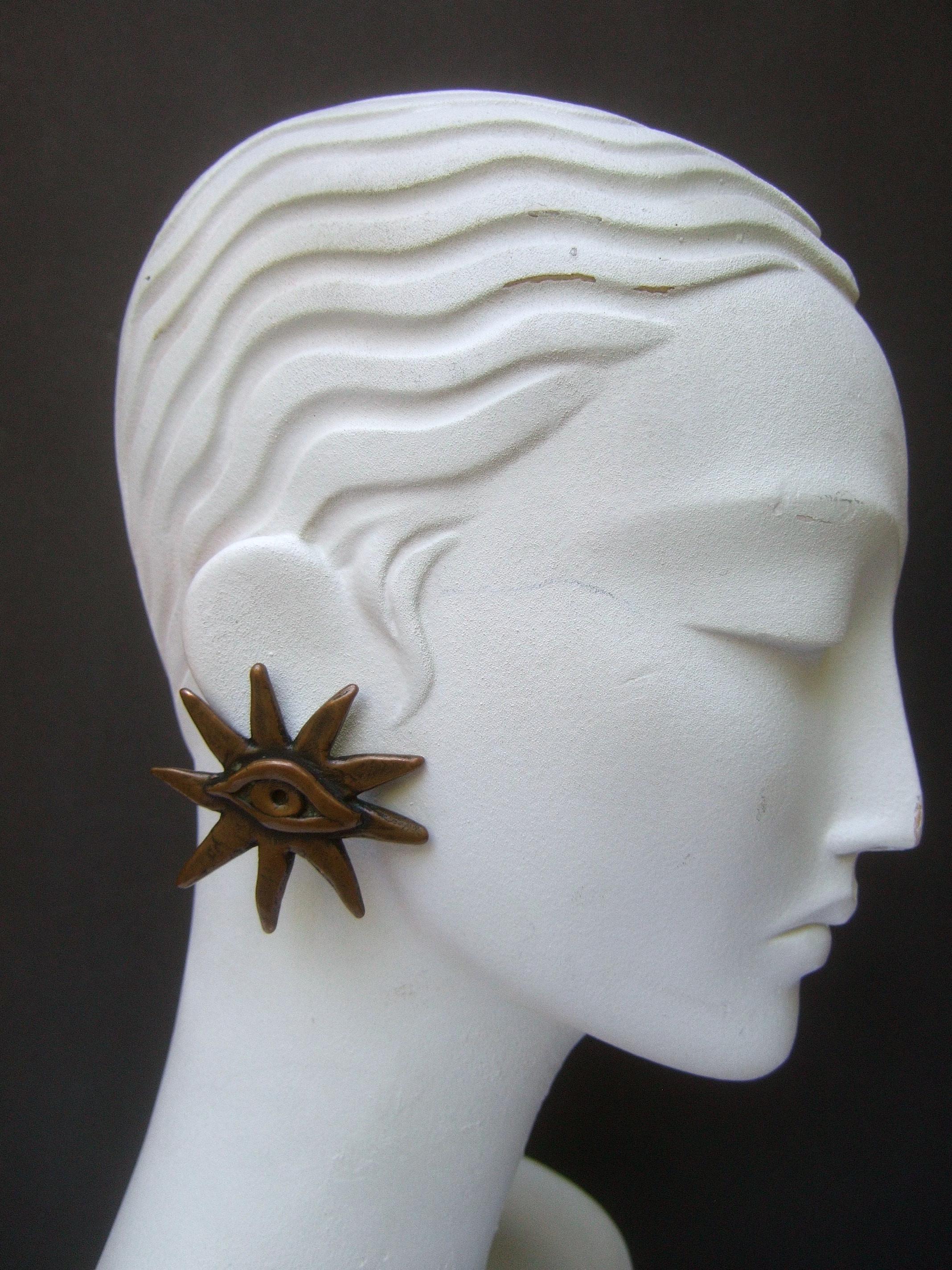 Artisan French Surrealist Designer Bronze Sunburst Clip on Eye Themed Earrings c 1980