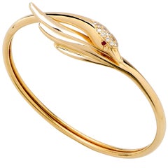 French Swan Motif Bangle with Diamonds and Rubies Set in 18 Karat Yellow Gold