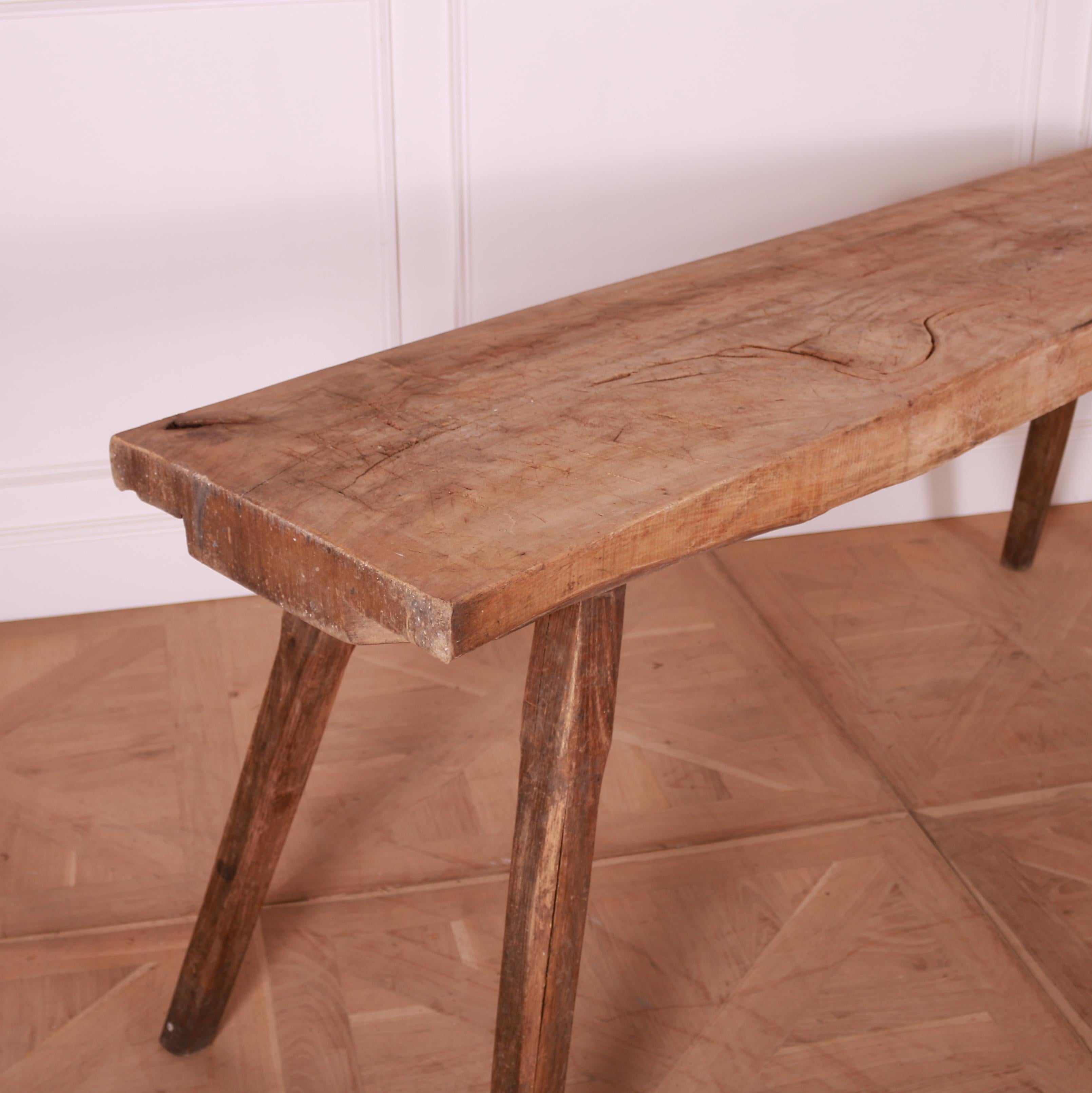 Large French primitive slab top sycamore and elm trestle table. 1880.

3