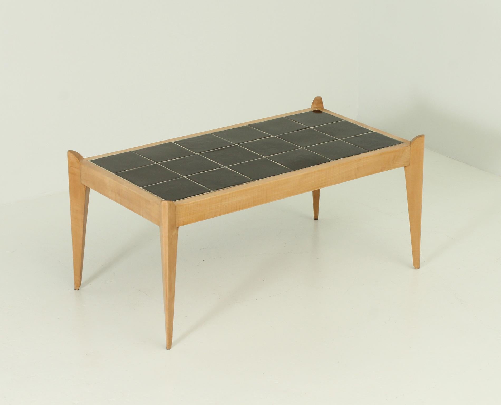 French rectangular coffee table from 1940's. Nice work in sycamore wood with top in black ceramic tiles.