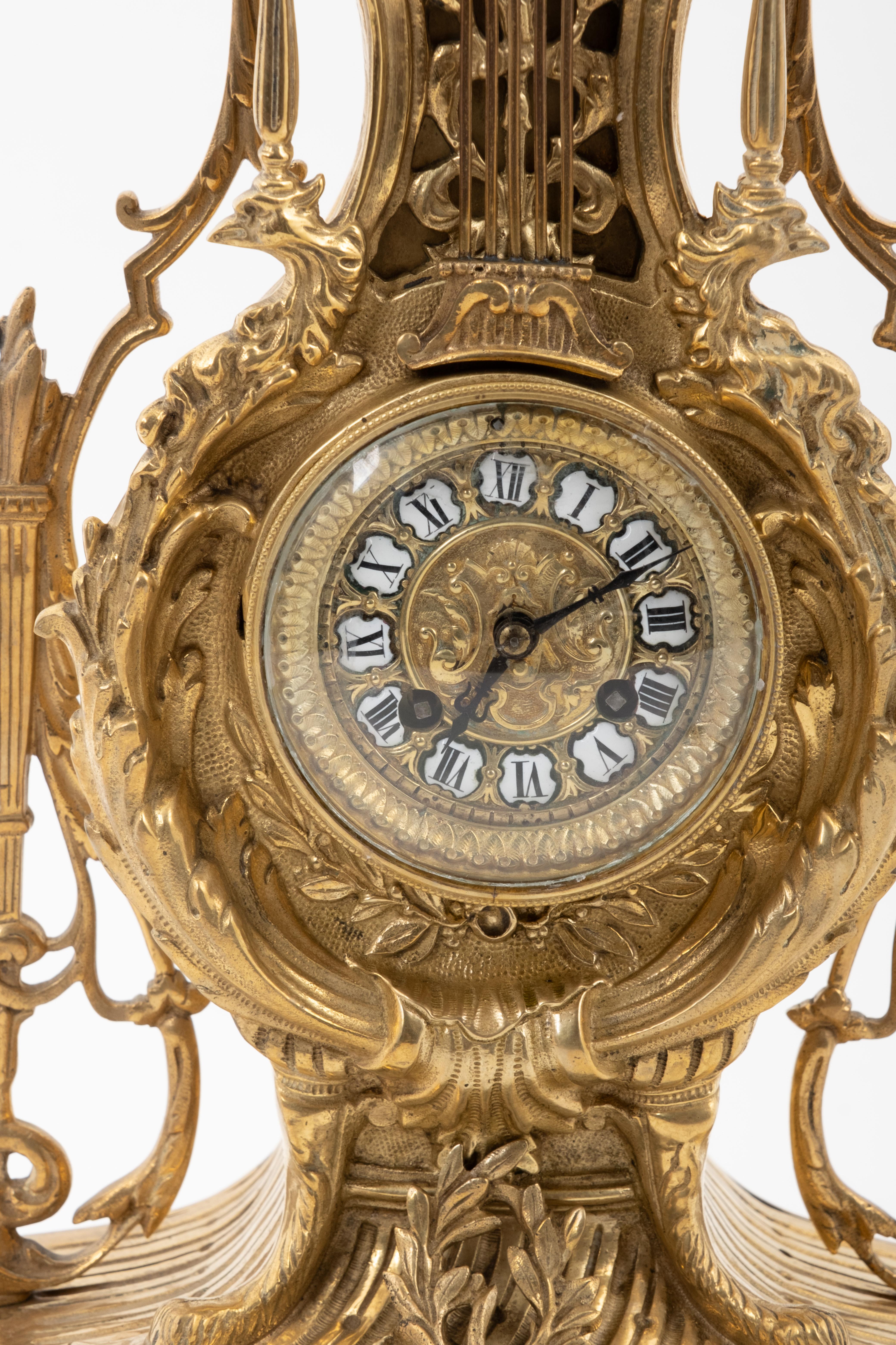 French Table clock Louis XV Style - Gilt bronze 22 inch tall In Fair Condition For Sale In Kingston, NY