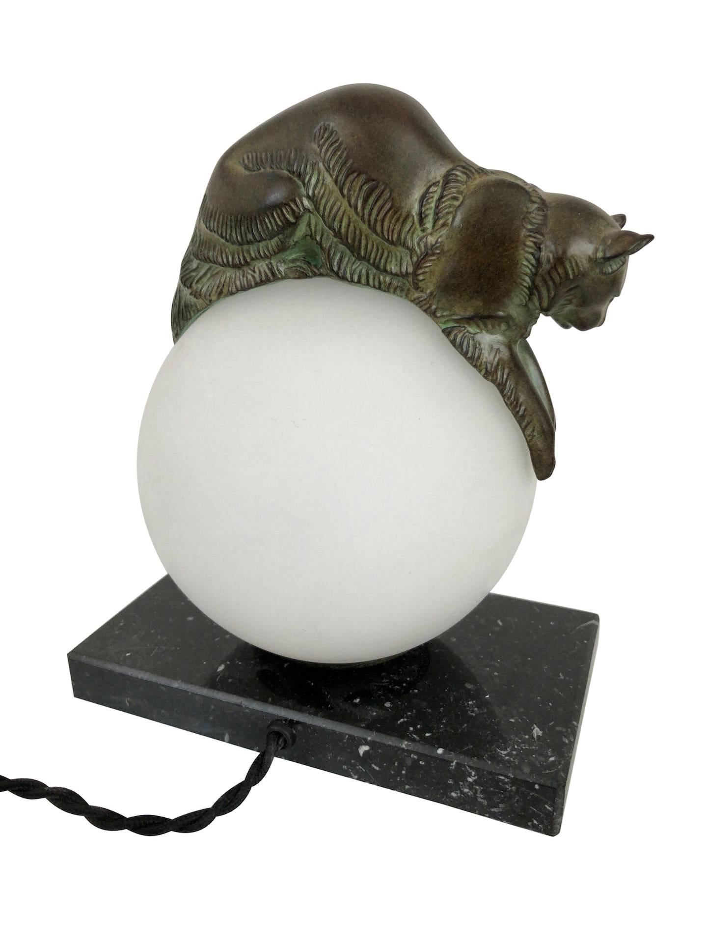 Patinated French Table Lamp Equilibre a Cat on a Glass Ball by Gaillard for Max Le Verrier