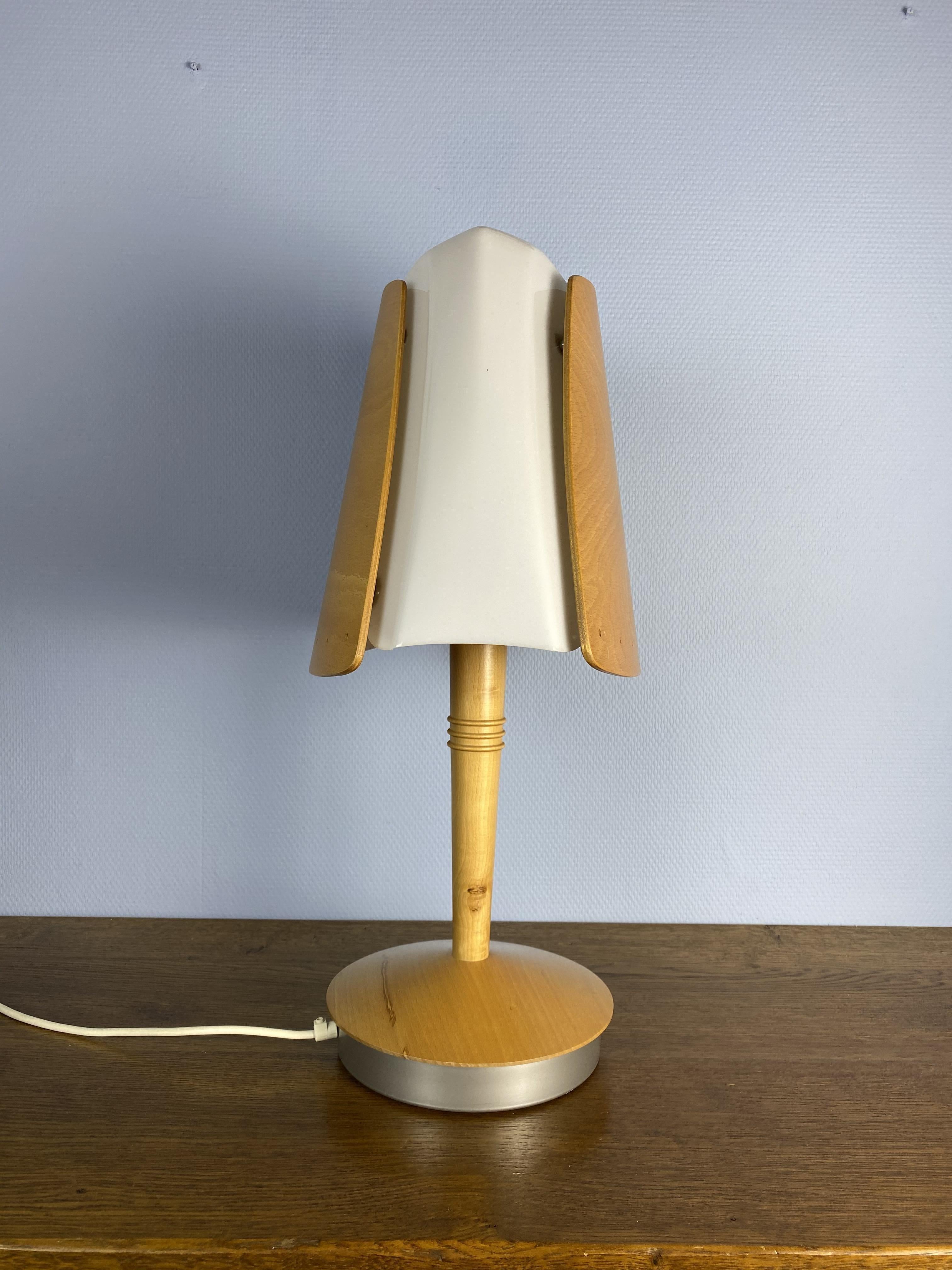 Scandinavian style table lamp by Lucid, France for the special exclusive order from Hilton Hotel in Barcelona. Shade is made of methacrylate and wood.