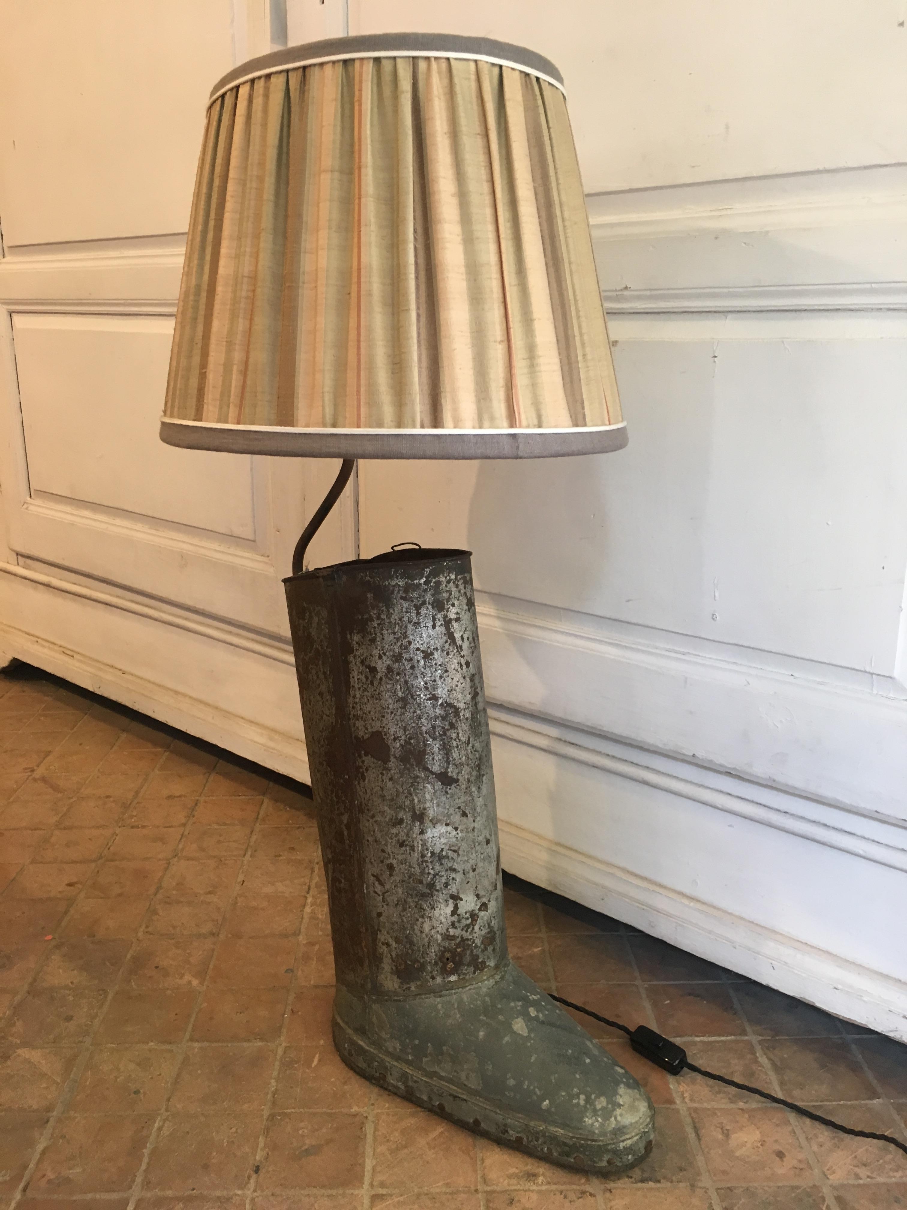 French table lamp made with an old iron boot ombrella stand from 20th century.