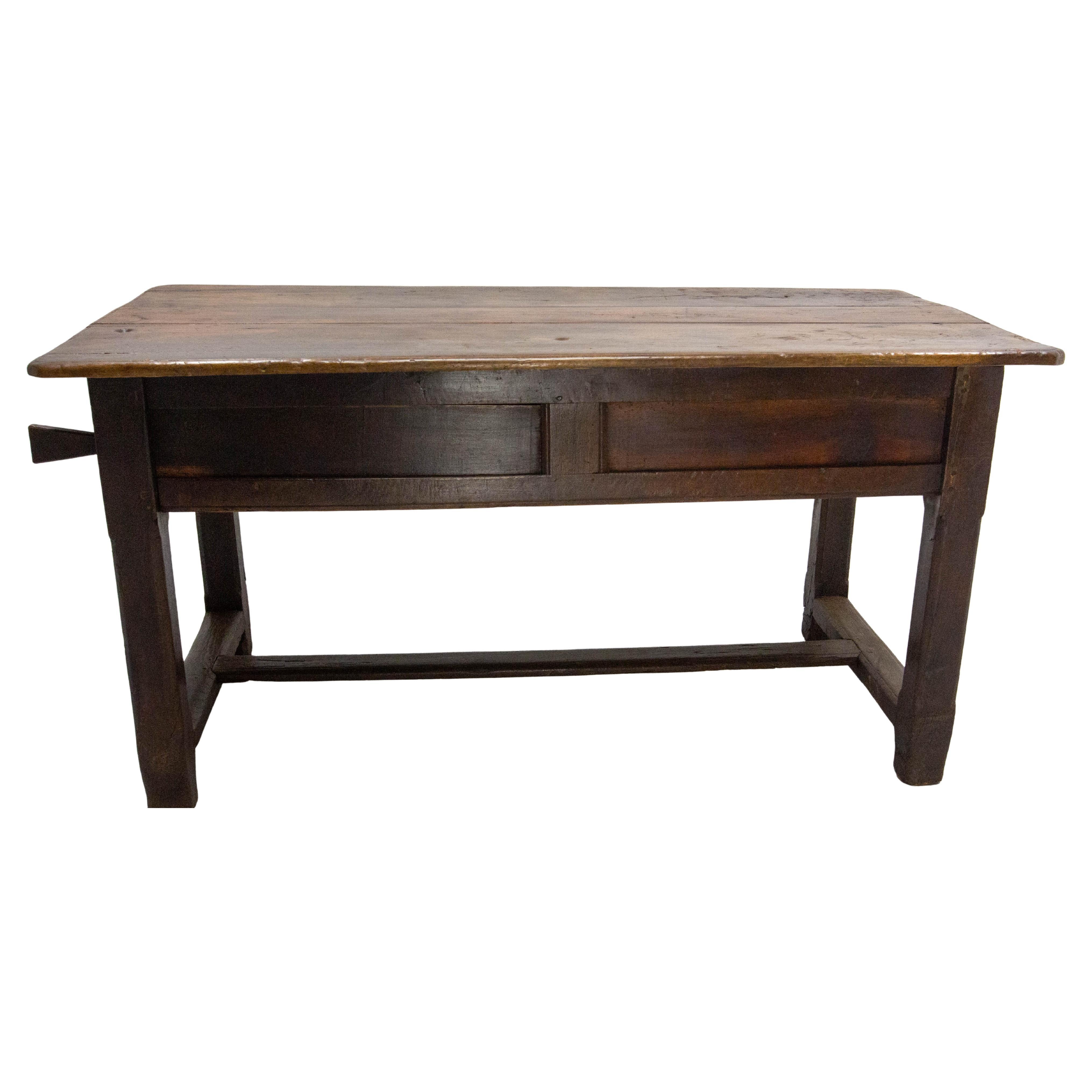 French table made in the 18th century French Provincial 
This type of table had a triple function: 
- it could be used to store flour and knead bread (which is why the top can be removed)
- the cabinet was used to store bread: storing bread in a