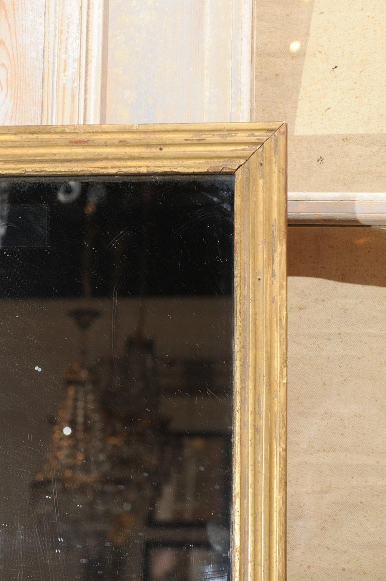 French Tall And Narrow Giltwood Mirror With Reeded Frame From The
