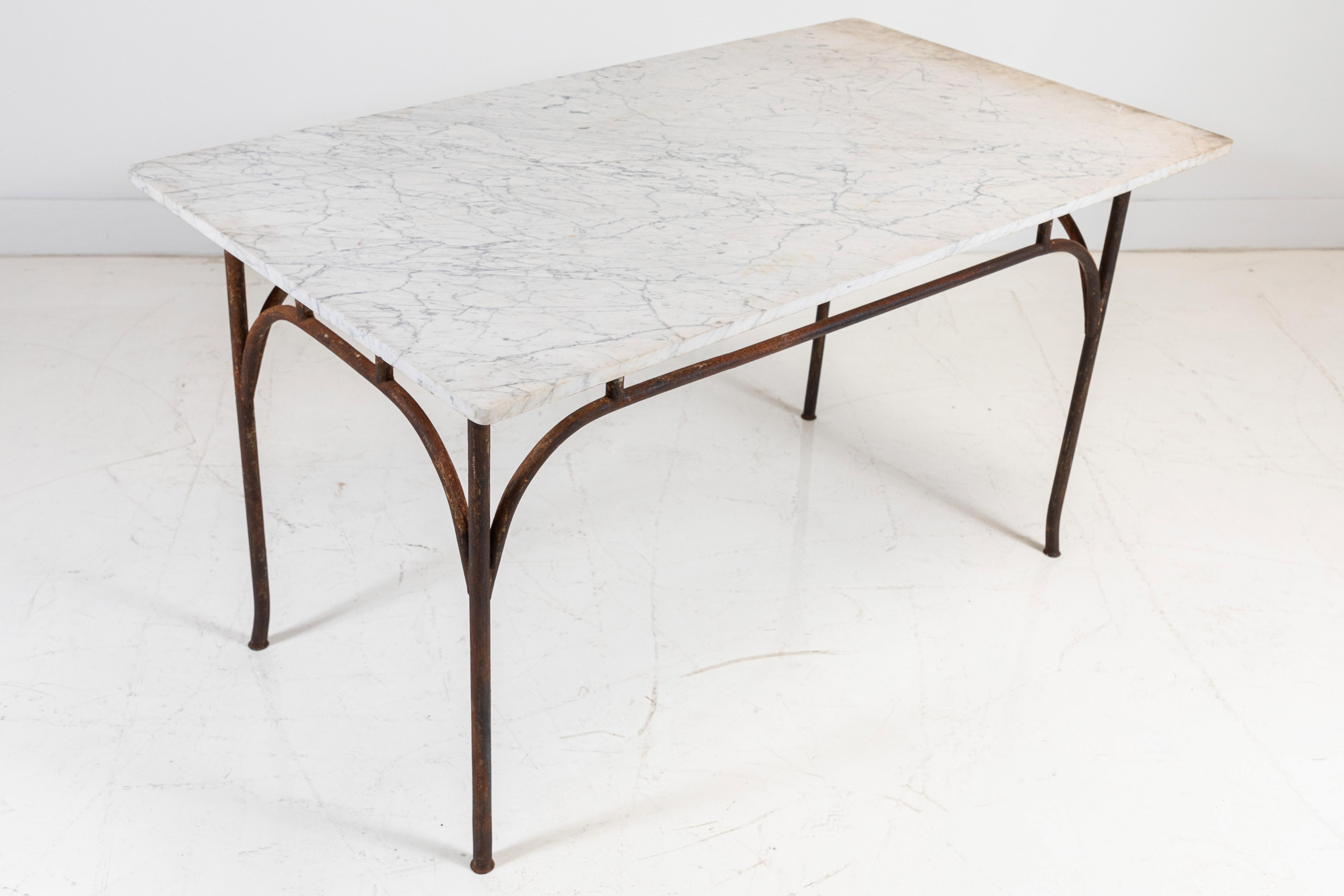 French tall marble and iron table. The table makes for a great kitchen island or outdoor garden piece.