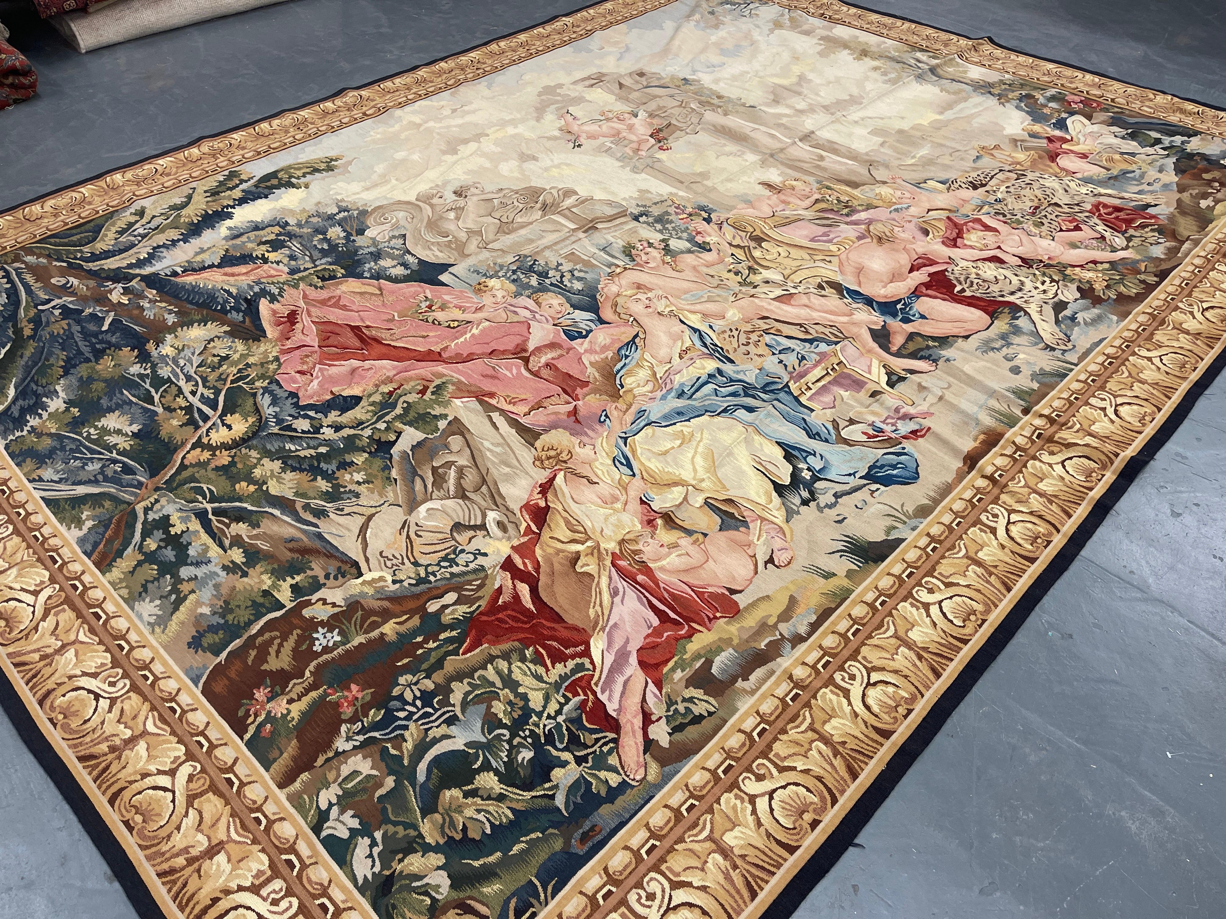 A fabulous 20th-century handwoven tapestry in excellent condition. The scene of celebration among nature. A similar technique is used for making the tapestry, as in Aubusson and Needlepoint in the flat weave role. These decorative area rugs are