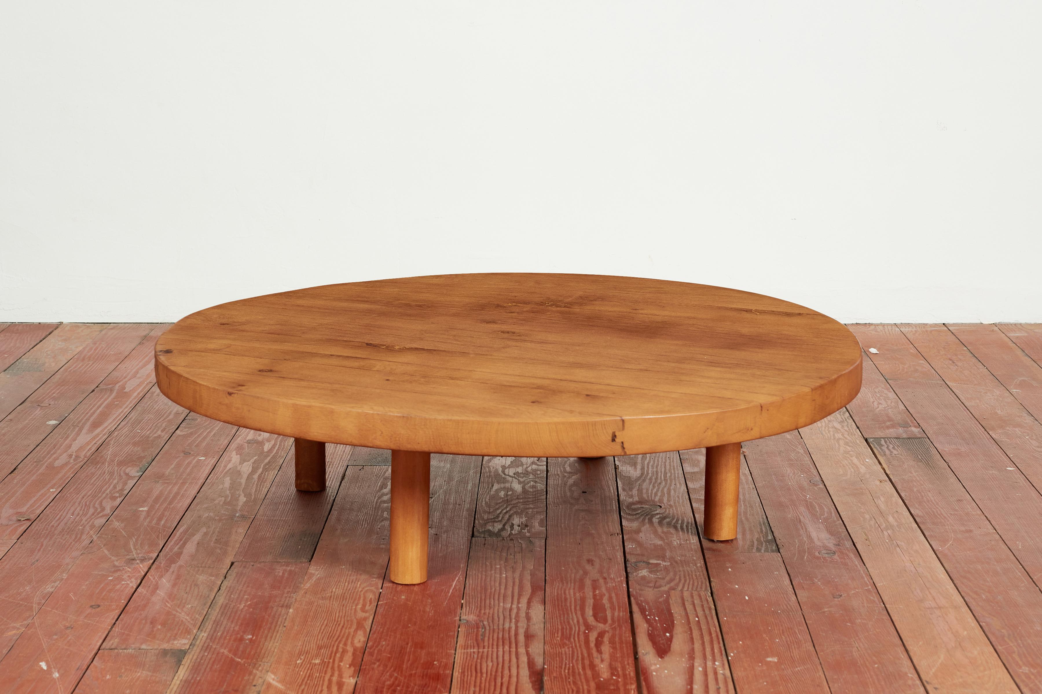 French teak coffee table in the style of Pierre Chapo 

Incredible quality with thick slab of teak wood top with cylinder legs. 

Wonderful warm patina. 

France 1950s.