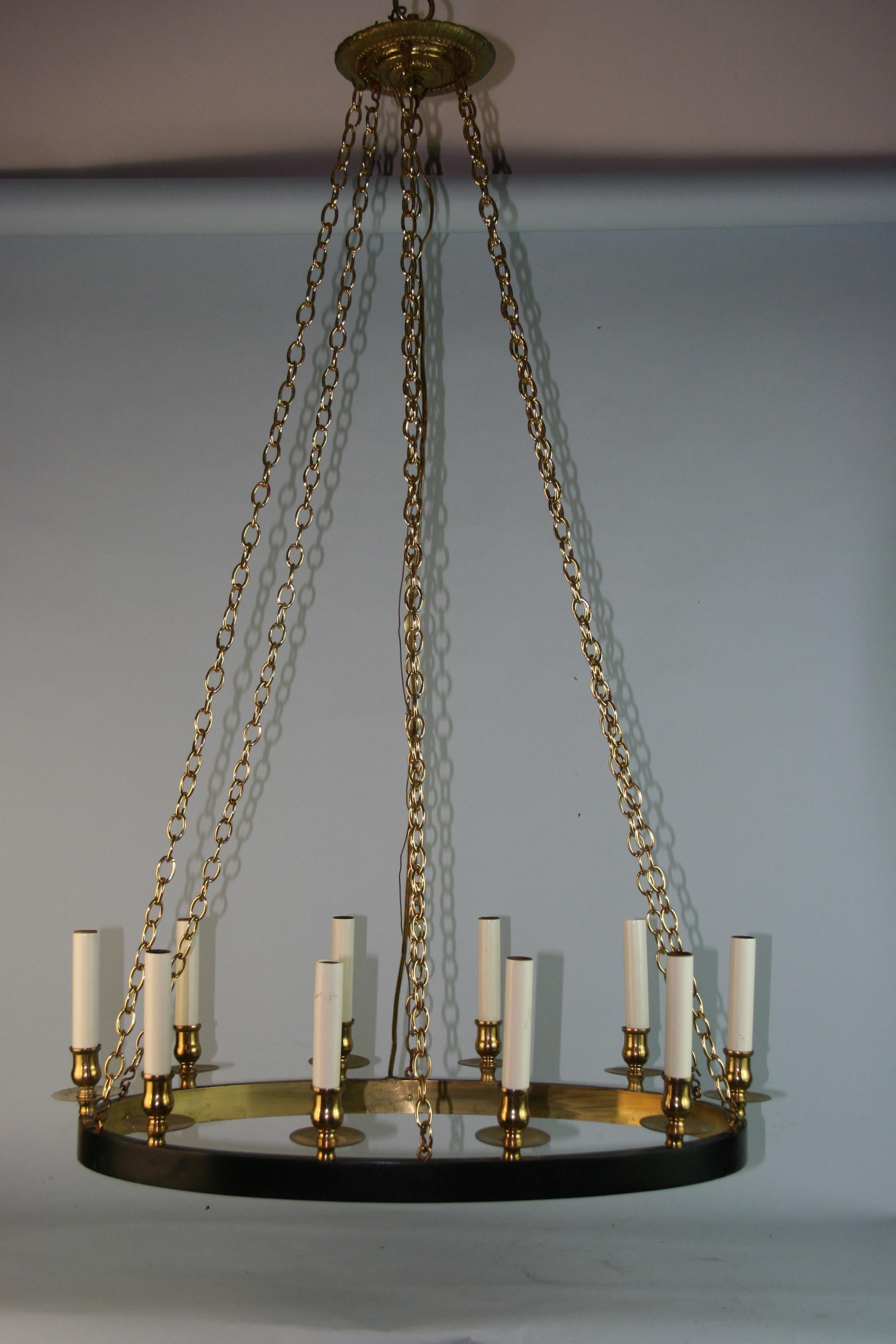 1311 French 10 light oval brass chandelier
Takes 10 25 watt candelabra based bulbs.
