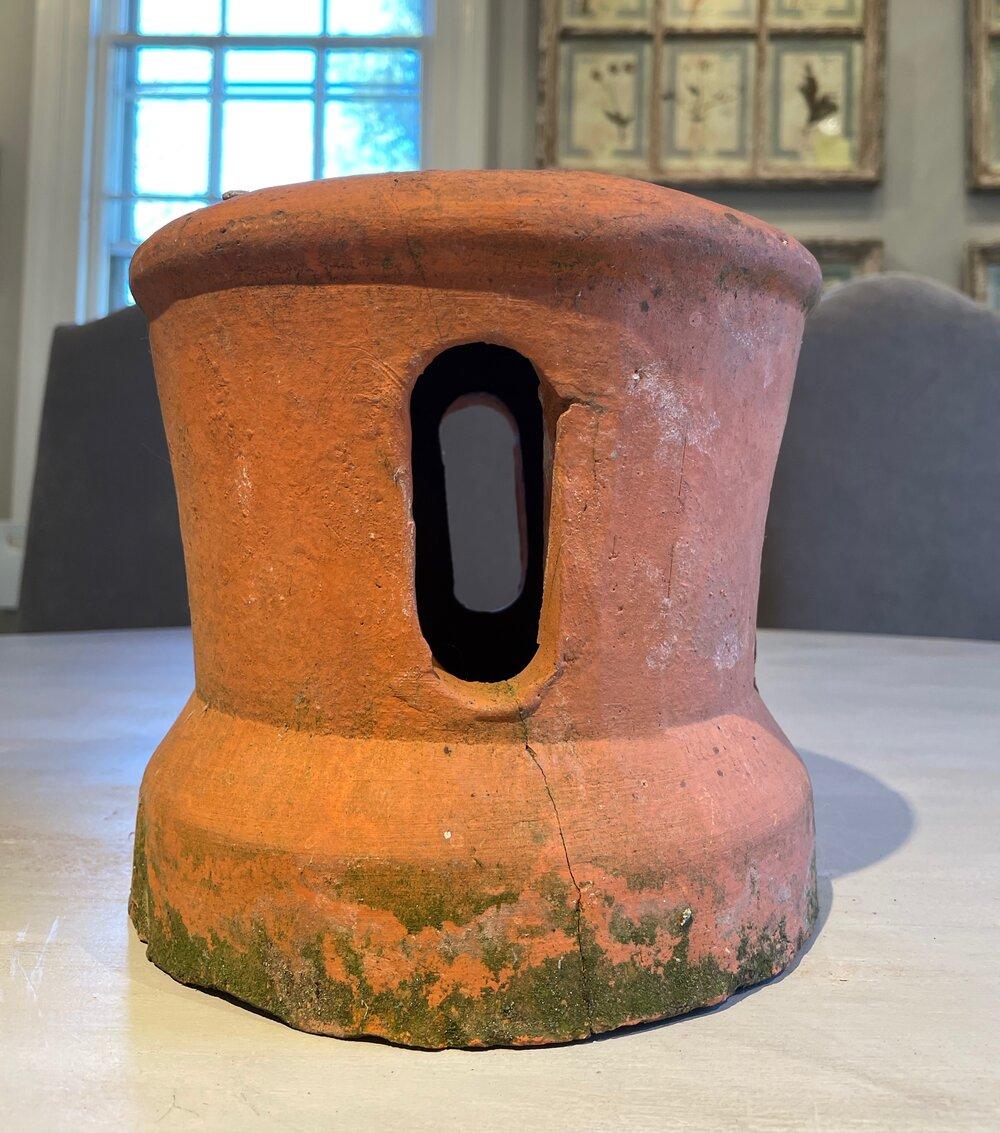 Occasionally we find nicely patinated chimney toppers in France and this is an unusual one because it has an incised heart. In very good condition with weathering and some lichen, it has a few minor chips. Place a pillar candle on a saucer inside