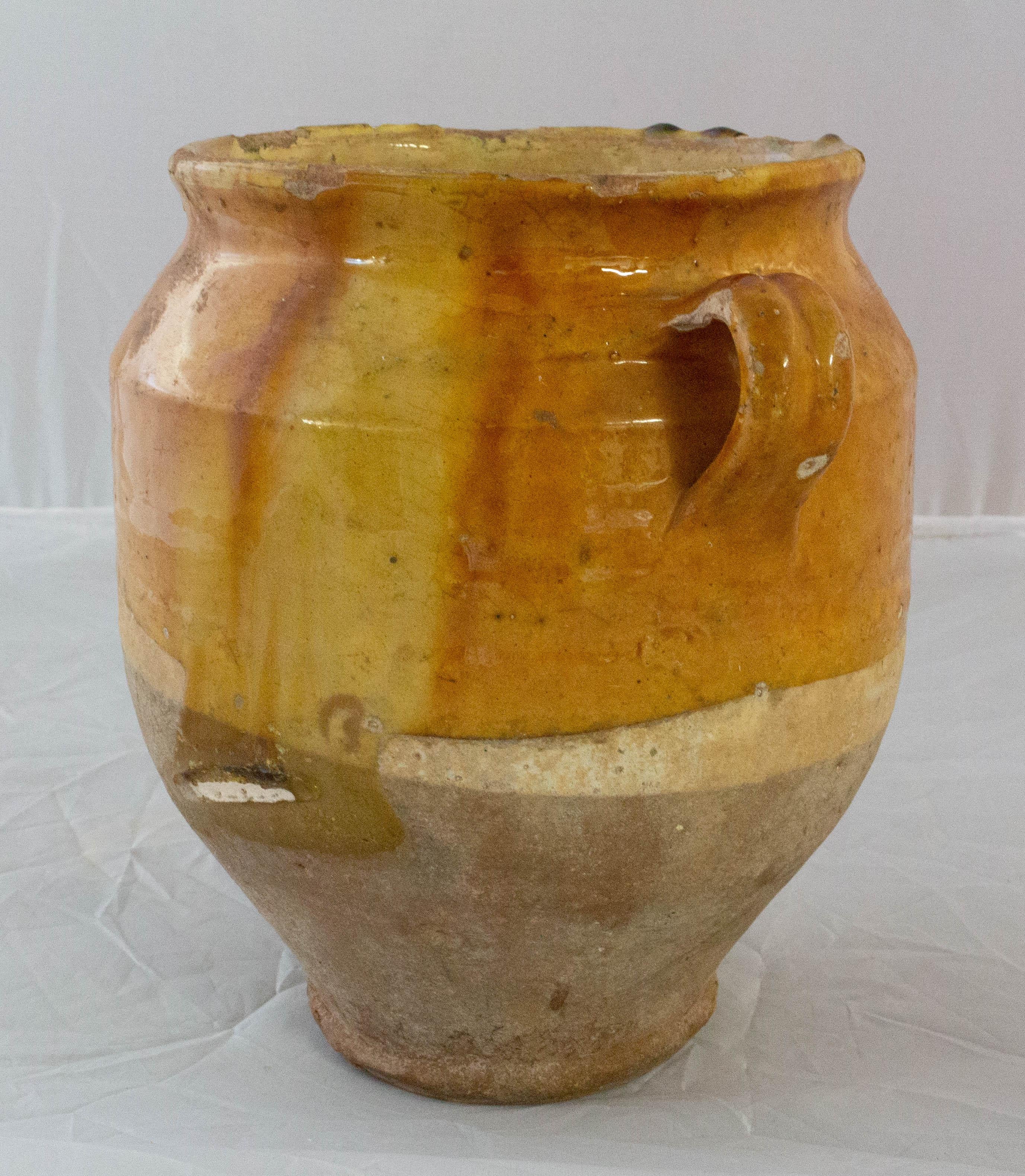 French terracotta confit pot
Traditional large earthenware pottery confit pot from South West France with yellow glaze
This vessel was used from the 19th-mid-20th century to conserve food
Very decorative
Good patina and bright yellow