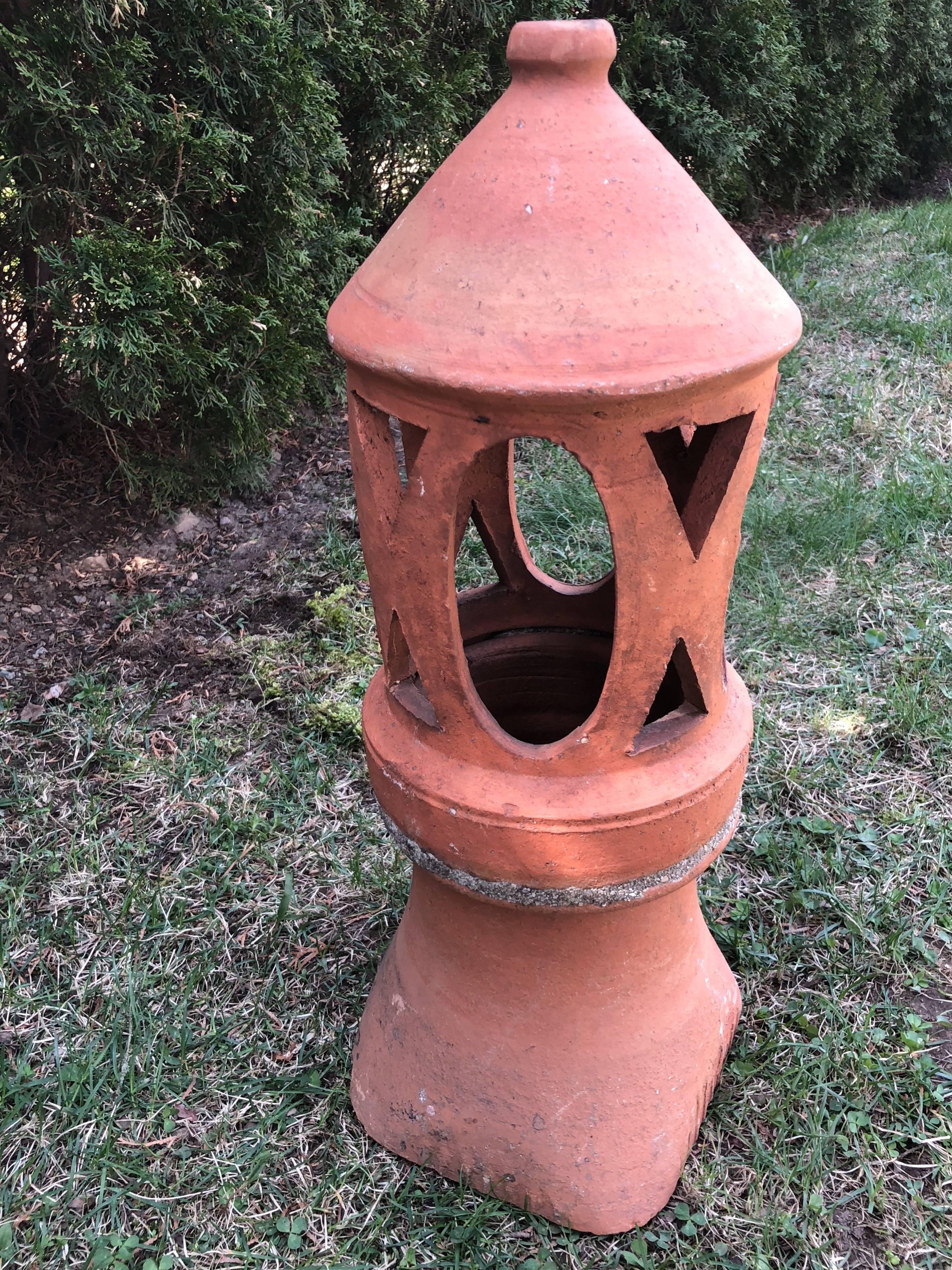 Originally used as chimney caps on French houses, we love to use these as decorative lanterns in the garden with a fat pillar candle on top of a table or on a garden path. This one is all one piece and is in excellent condition. As you can see in
