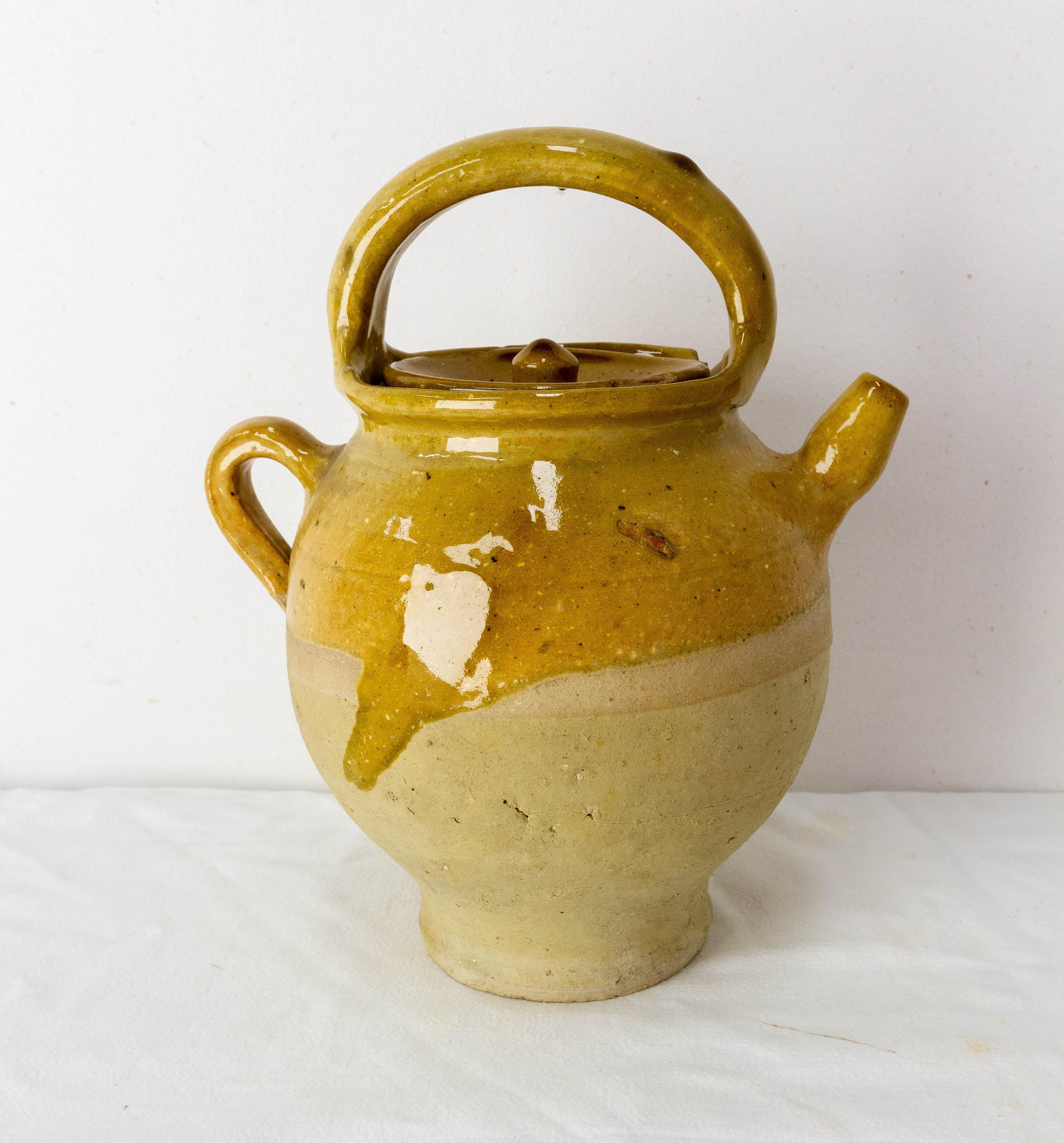 Terracotta jug with yellow glaze. This kind of pitcher was used to keep the water fresh, at a time when electricity did not exist.
Very decorative.
Good patina and bright yellow color.
Good antique condition with a small splinter on the collar,