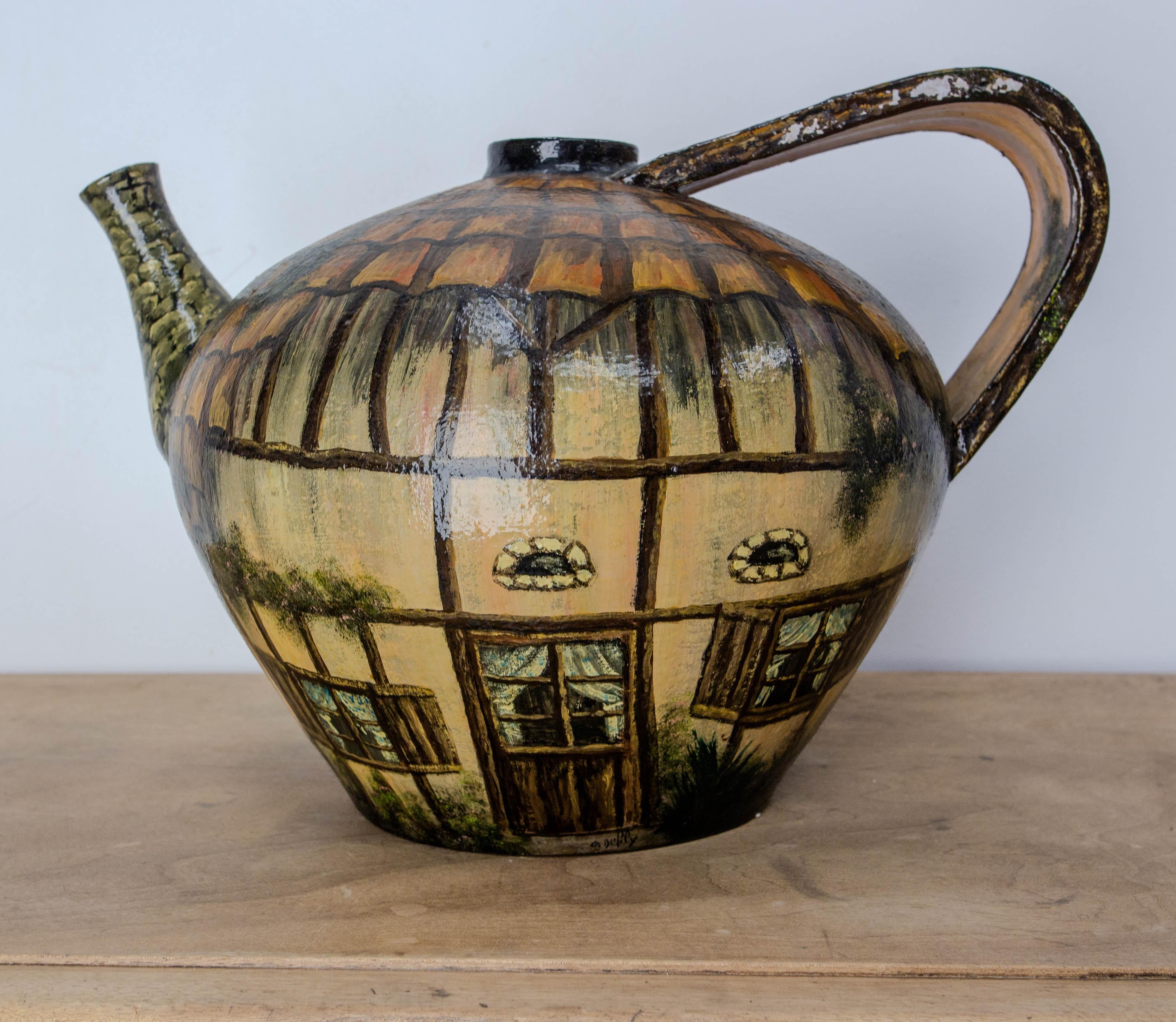Antique terracotta jug French Basque hand painted signed by Artist.
This terracotta pitcher from Basque Country was later painted, circa 1970.
Good and heavy.
Oil paints with white under coat.
In the 19th century, this pitcher was used to keep the