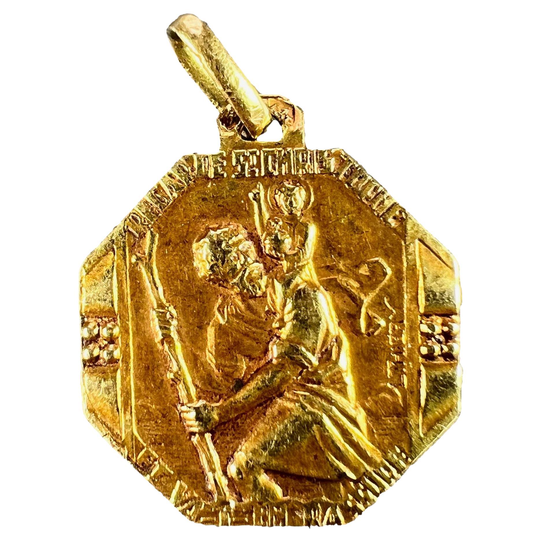 French Thiery Saint Christopher Triumph of Speed 18K Yellow Gold Charm Pendant For Sale