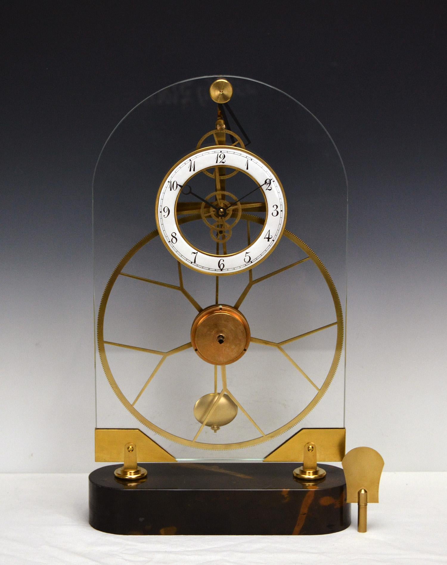 French Style Thin Glass Pinwheel Escapement Great Wheel Skeleton clock with marble base.

Here is a very rare glass mystery skeleton clock. This is a very accurate timing skeleton clock. Within 8 days, the clock won't miss one minute in every 24