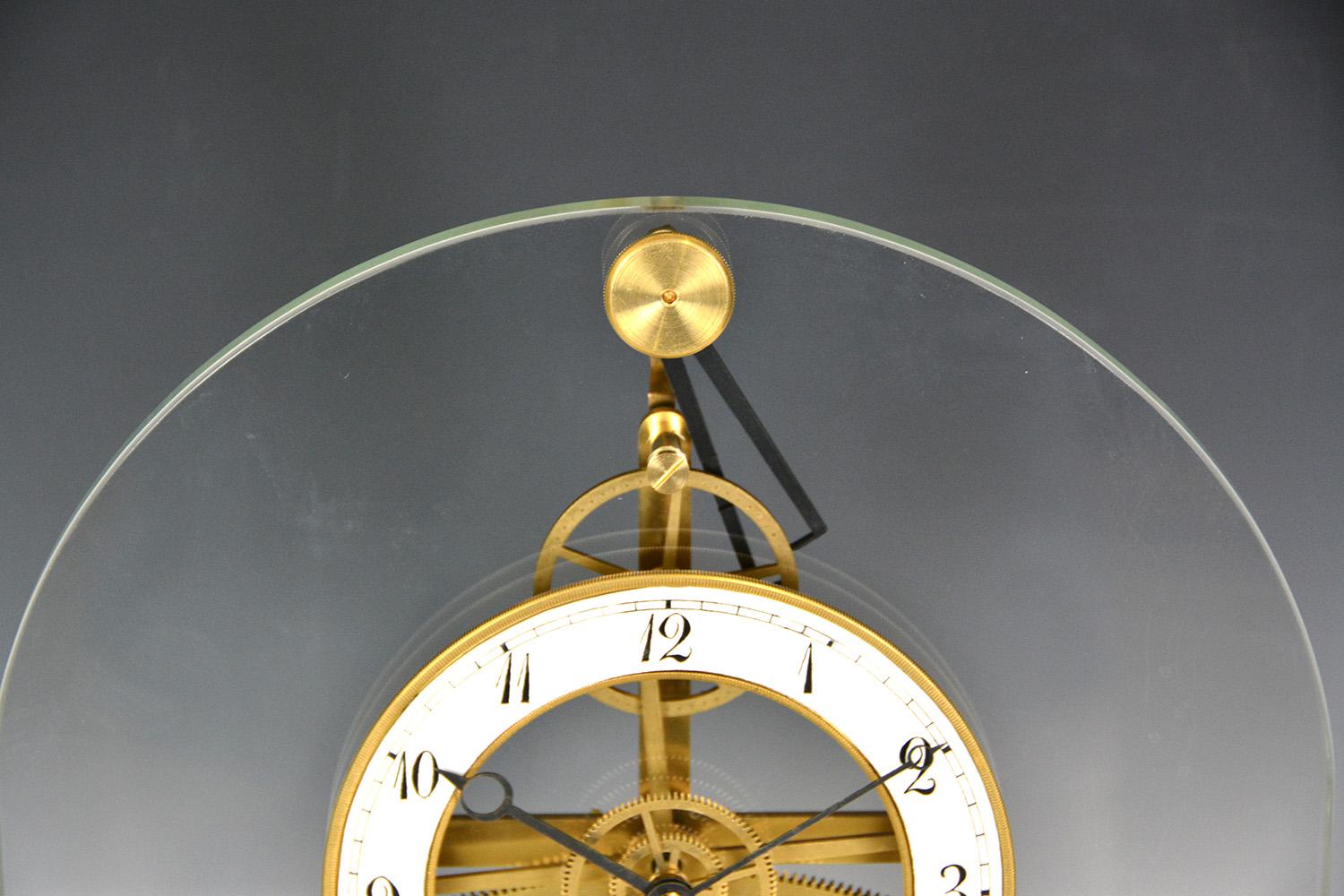 Contemporary French Thin Glass Pinwheel Escapement Big Wheel Marble Base Skeleton Clock For Sale