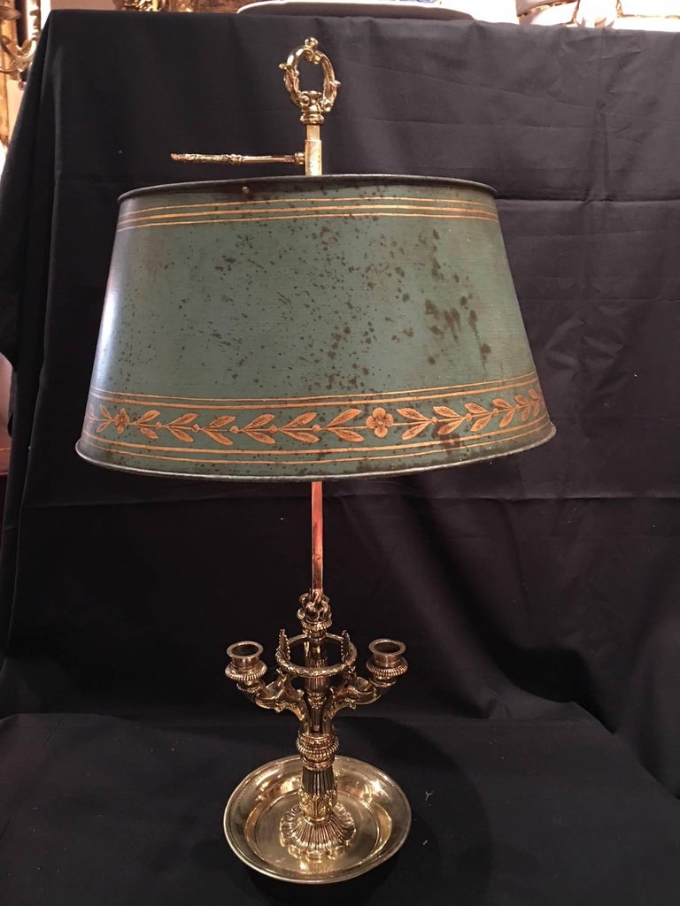 French three-candle bouillotte lamp with a painted metal shade, 19th century. Lamp can be electrified at no additional cost.