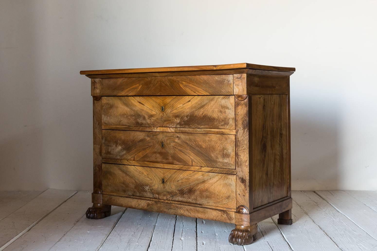 Early 20th Century French Three-Drawer Dresser with Beautiful Wood Details and Claw Feet