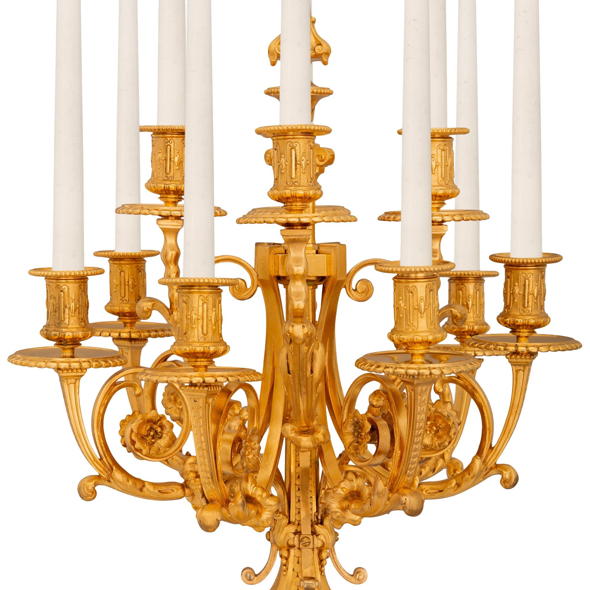 Regency French three piece garniture set, signed by the Lemerle-Charpentier foundry For Sale