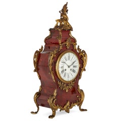 French Three-Piece Tortoiseshell and Gilt Bronze Clock Set