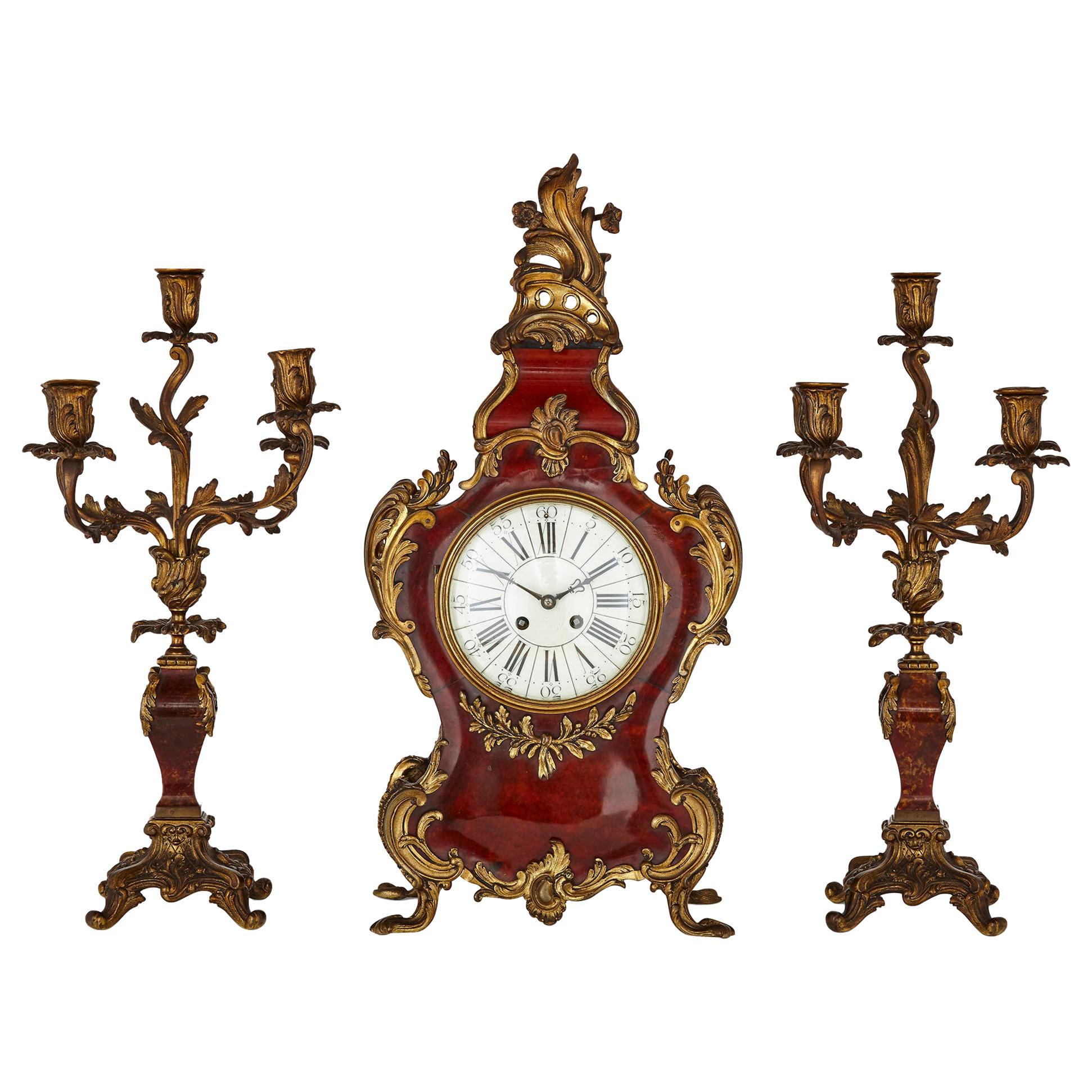 French Three-Piece Tortoiseshell and Gilt Bronze Clock Set For Sale