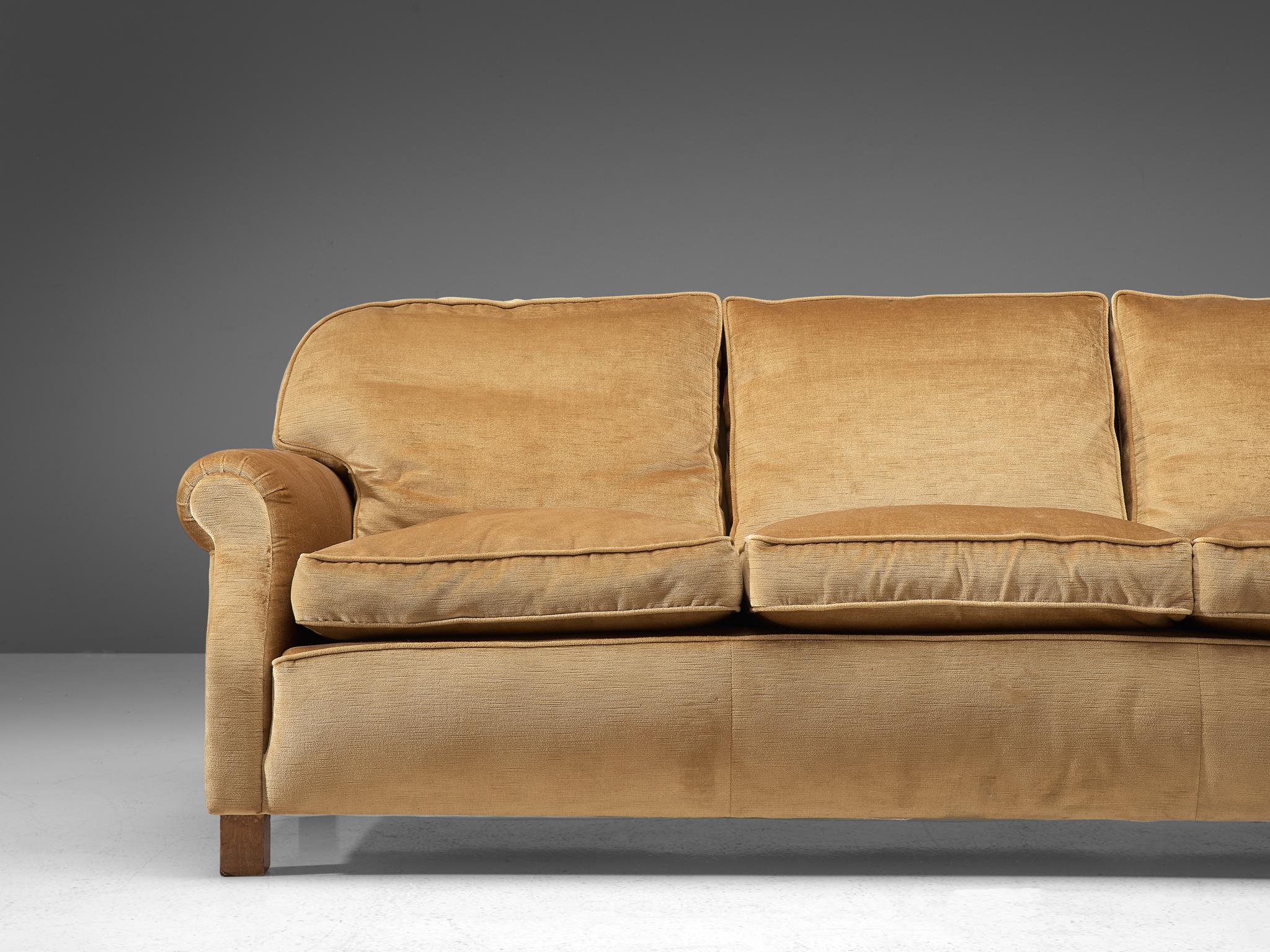 beige velvet sofa