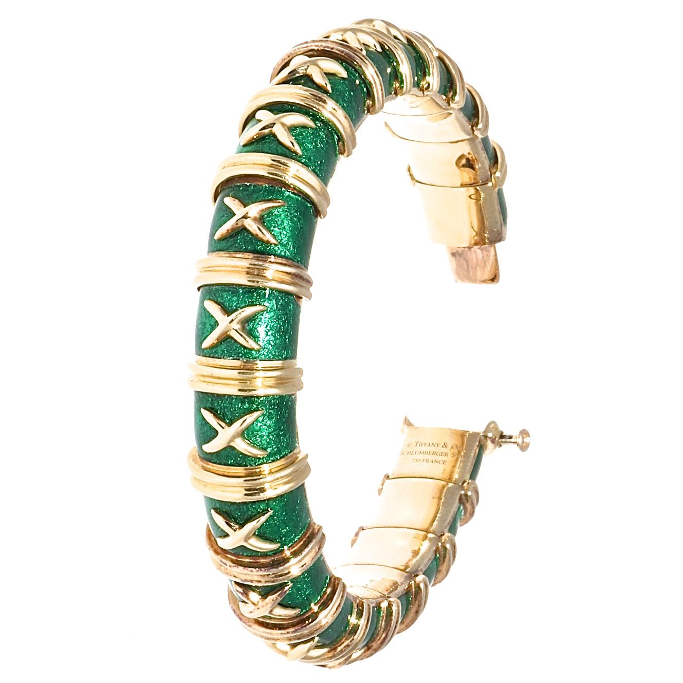 If you are looking for a rare, coveted, designer signed jewel, this bracelet is THE ONE. Vintage Tiffany and Co. Schlumberger Croisillon bracelet. The rich green enamel is very pleasant to the eye and will add a pop of color to your look. Signed